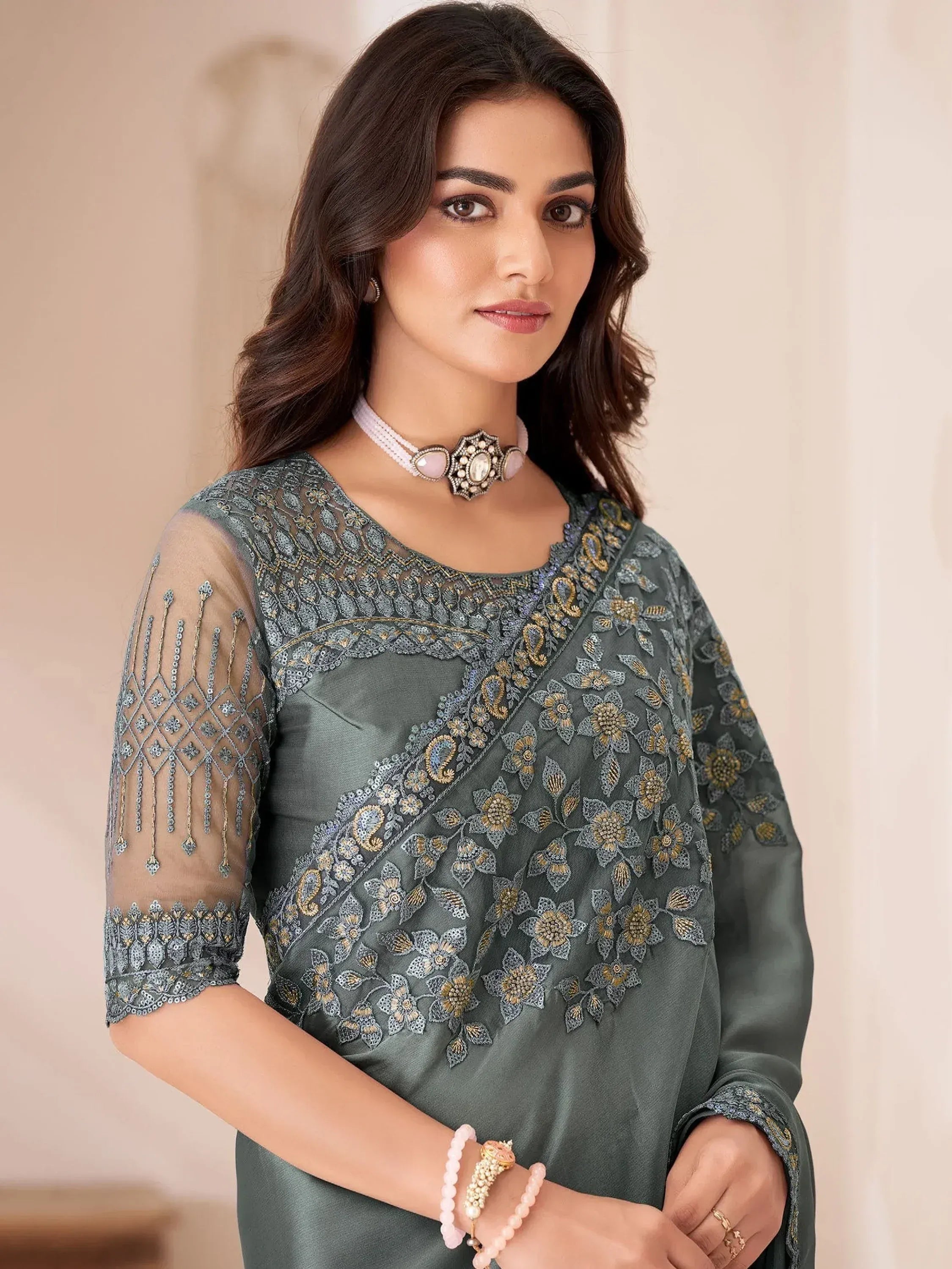 Elegant grey embroidered ethnic kurti with sheer sleeves and floral detailing, perfect for Indian wear.