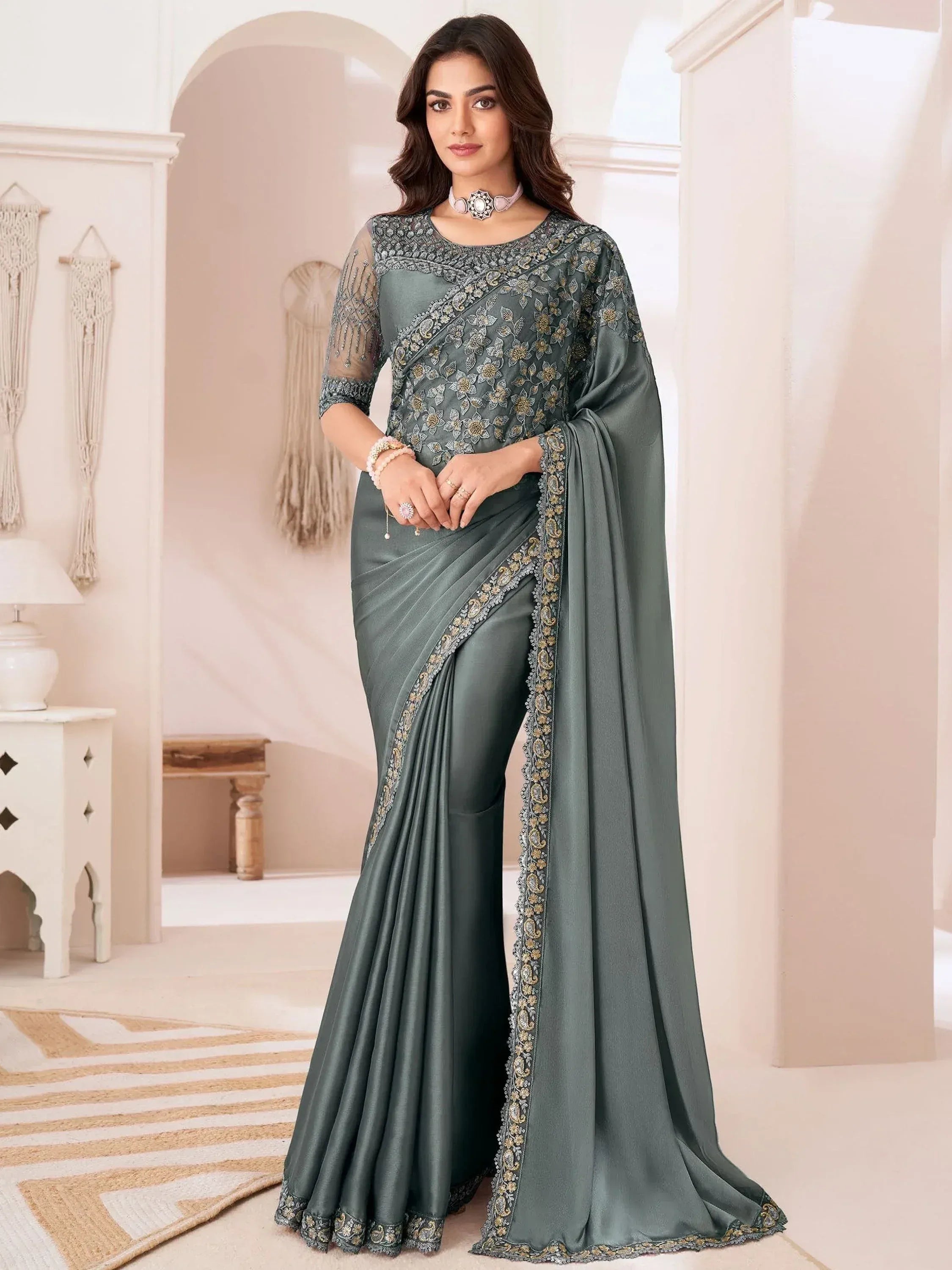 Elegant grey saree with gold floral embroidery and sheer sleeves, perfect for Indian ethnic occasions.
