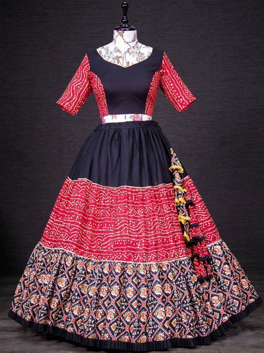 Black and red printed ethnic lehenga choli with floral blouse, perfect for Indian weddings and festivals