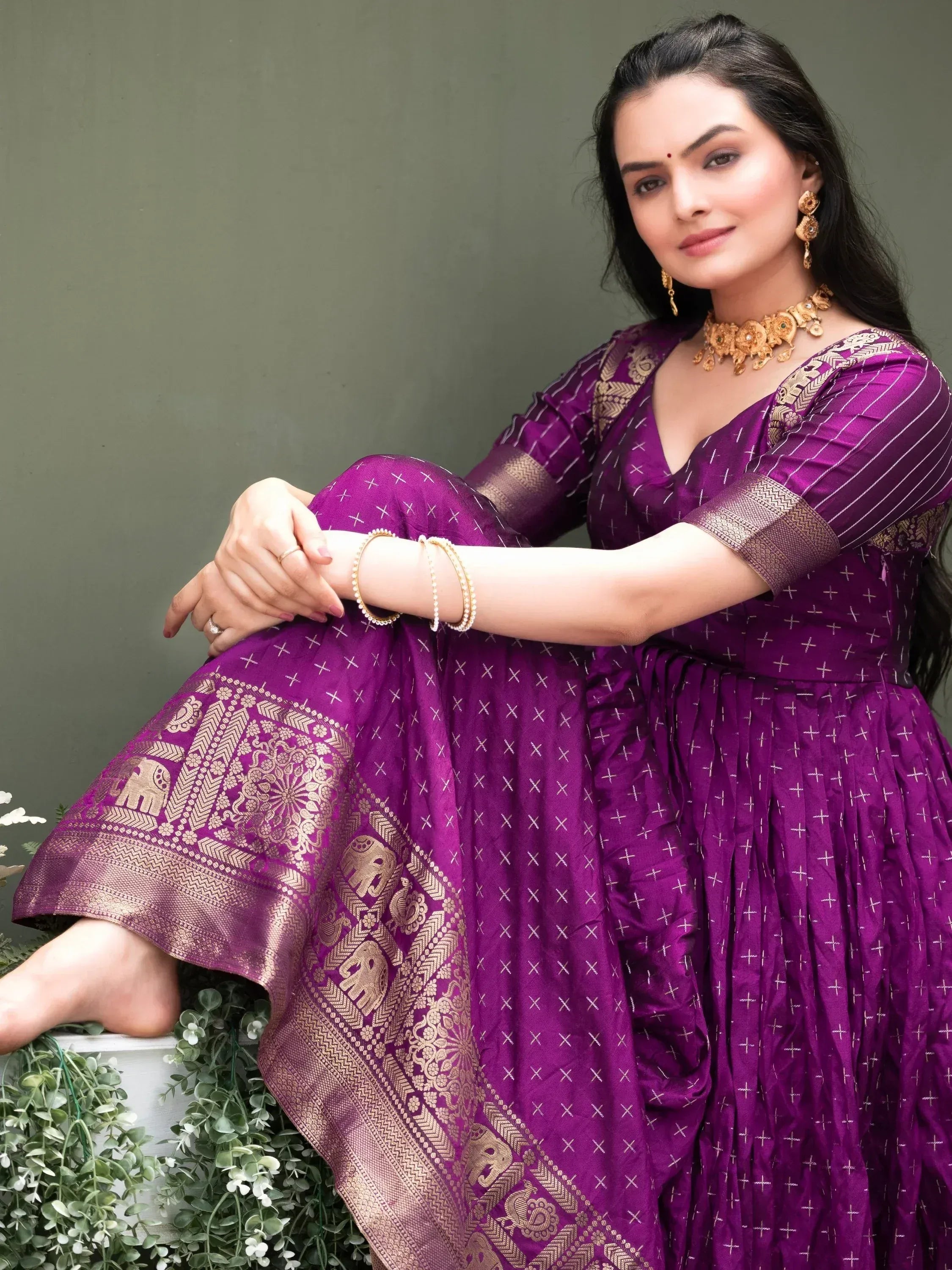 Purple ethnic gown with gold elephant print, perfect for Indian occasions and festive wear