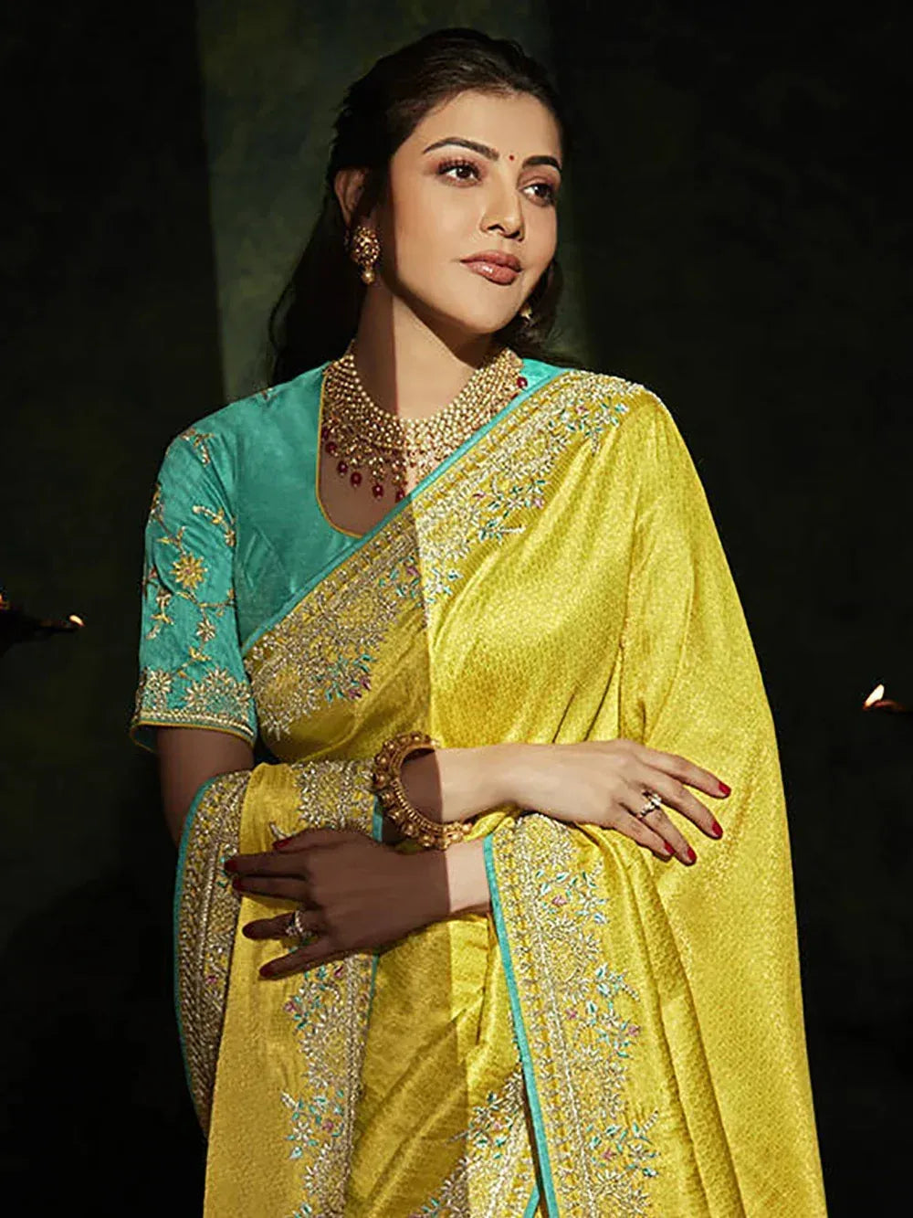 Yellow and teal embroidered saree with designer blouse, perfect for Indian ethnic occasions