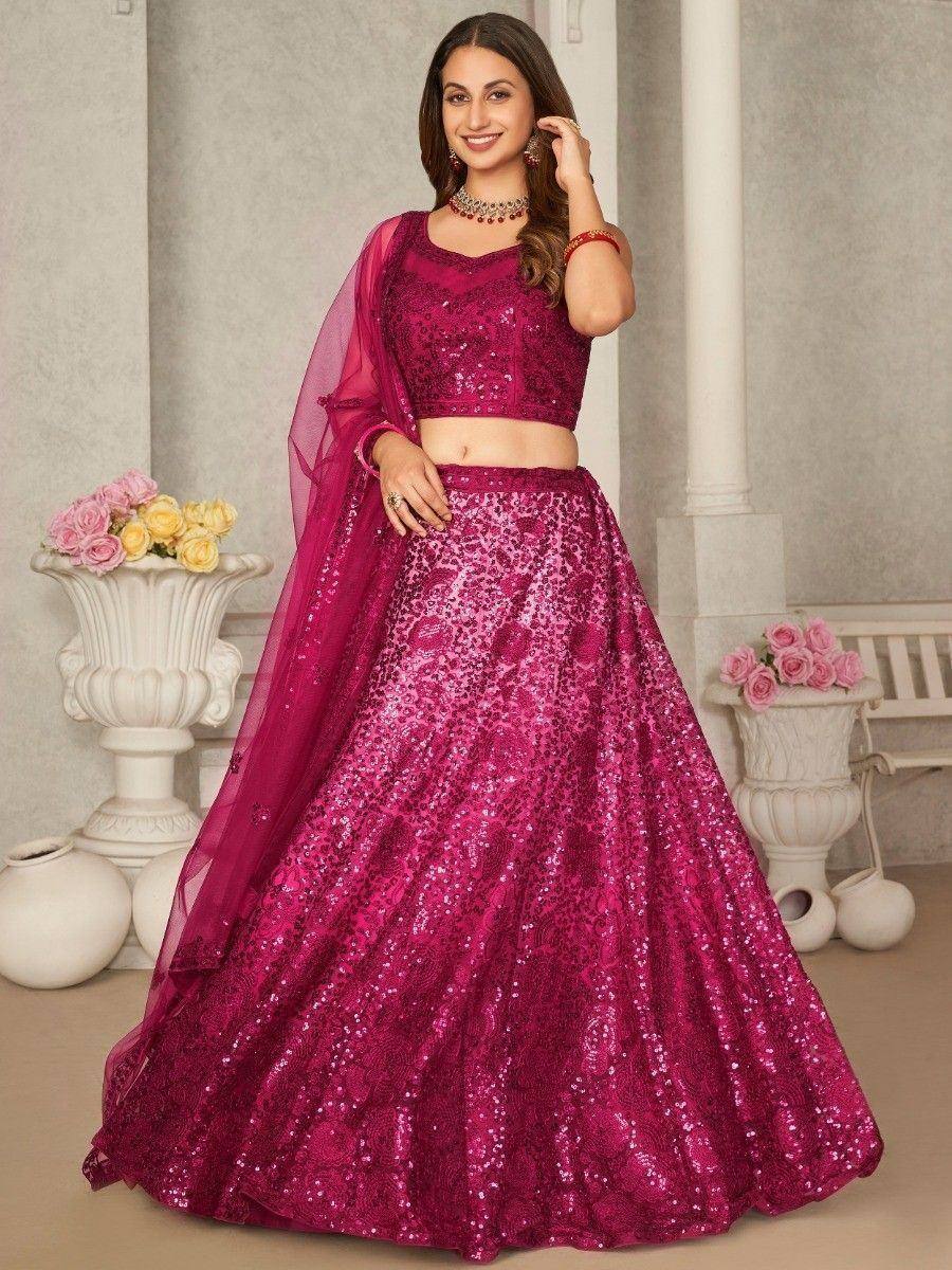 Fuchsia sequin lehenga choli with sheer dupatta, perfect for Indian weddings and festive occasions