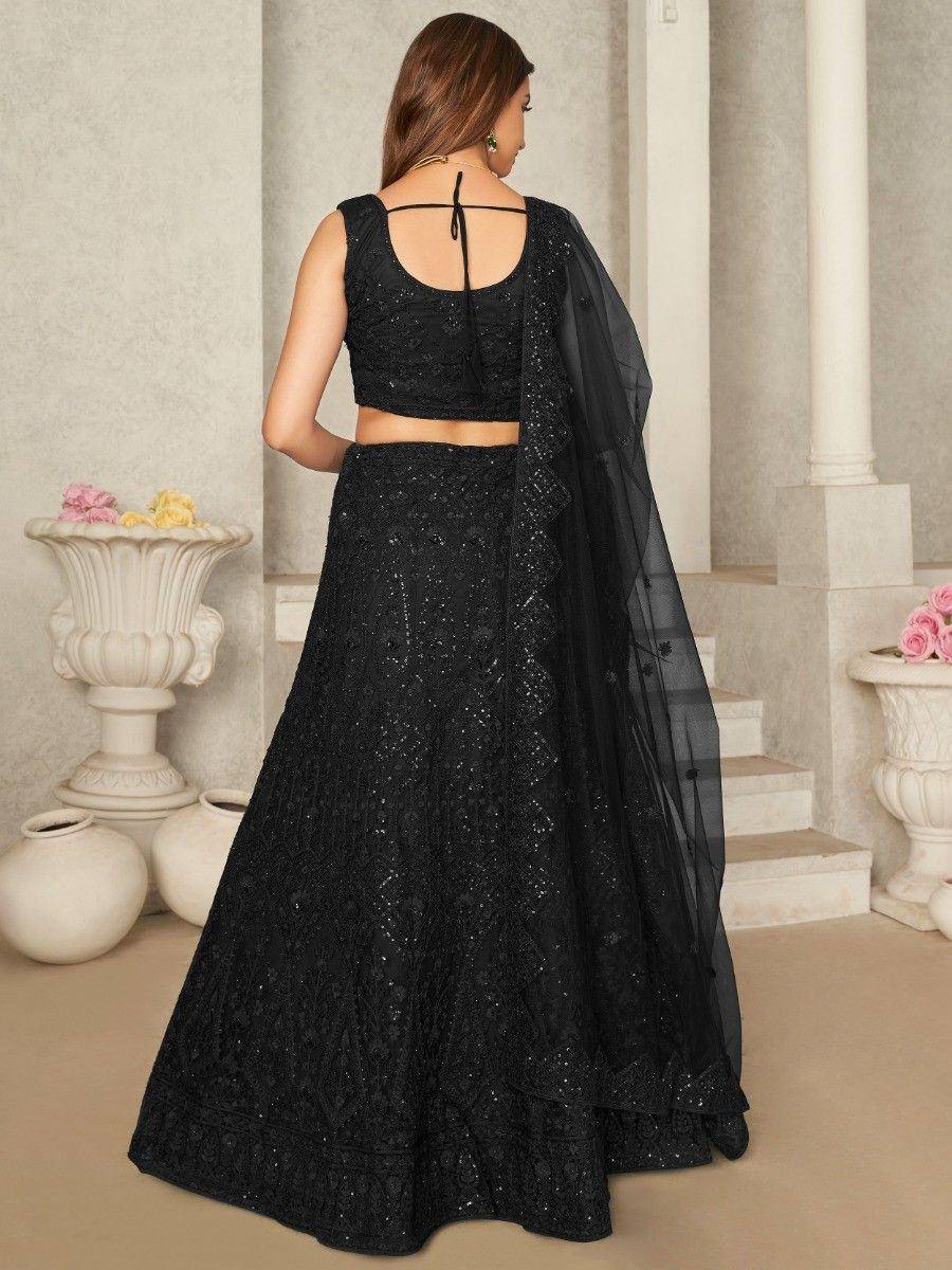 Black sequined lehenga choli with sheer dupatta, back view, ethnic Indian wear