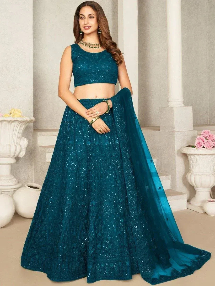 Teal blue designer lehenga choli with sequin embroidery, perfect for Indian weddings and festive occasions