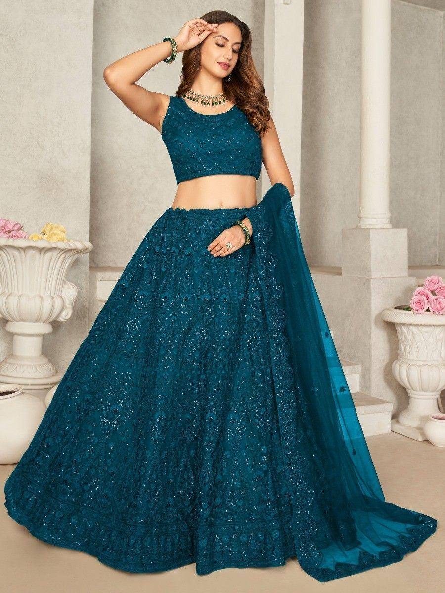 Teal embroidered lehenga choli with matching dupatta, perfect for Indian weddings and festive occasions