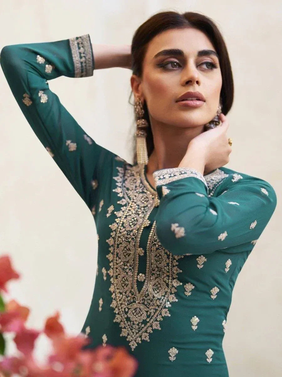Emerald green embroidered ethnic kurti with gold detailing, perfect for Indian festive wear