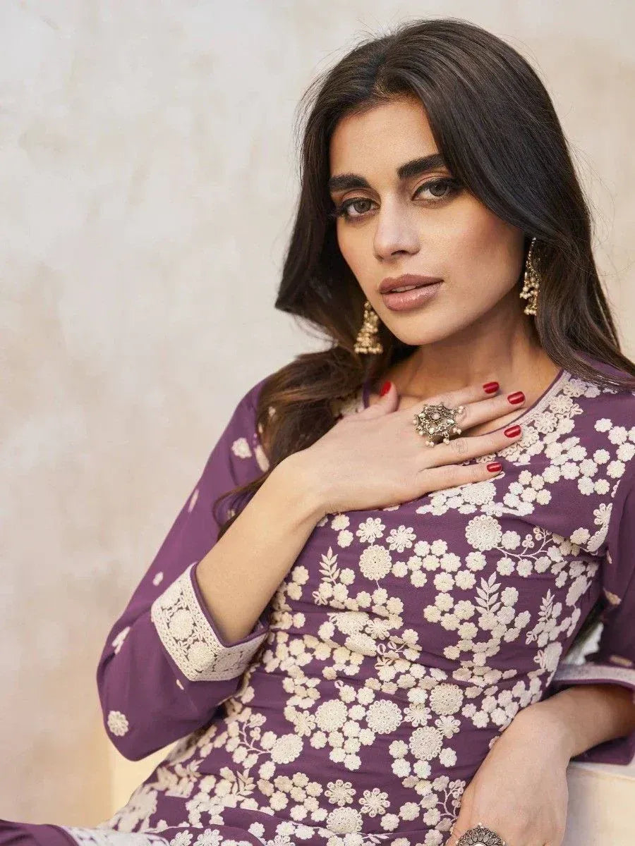 Purple floral ethnic gown with lace detailing, perfect for Indian wear trends