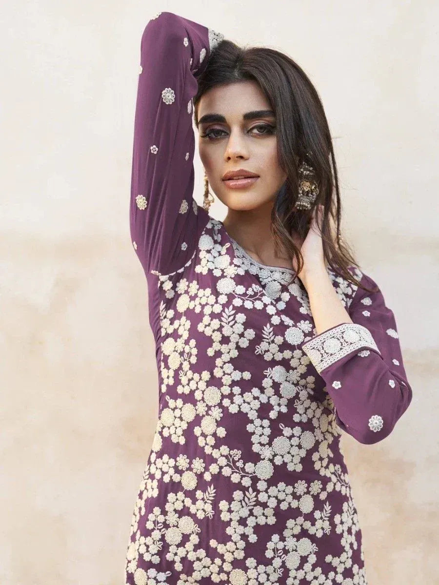 Purple floral embroidered ethnic kurti with intricate detailing and elegant design