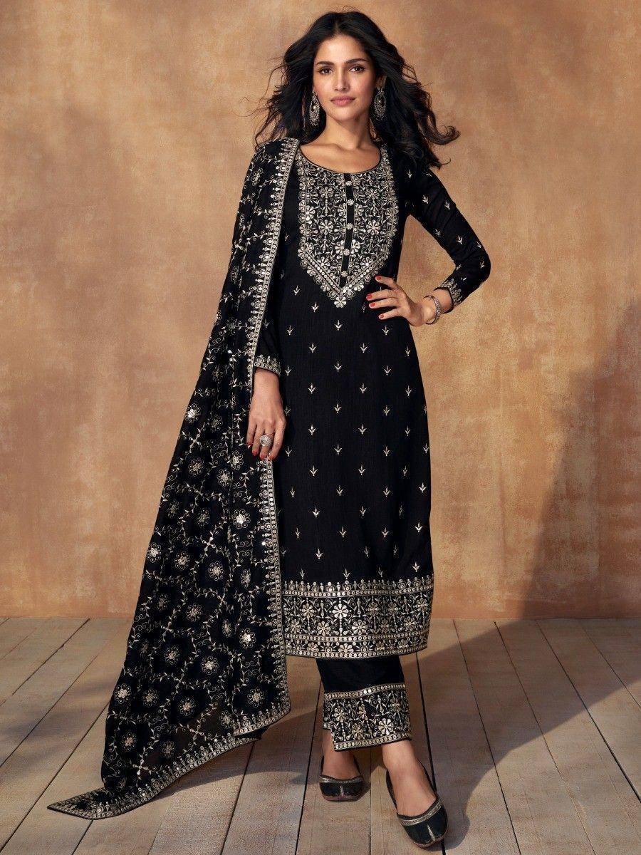 Woman in black embroidered salwar kameez with matching dupatta, ethnic fashion style