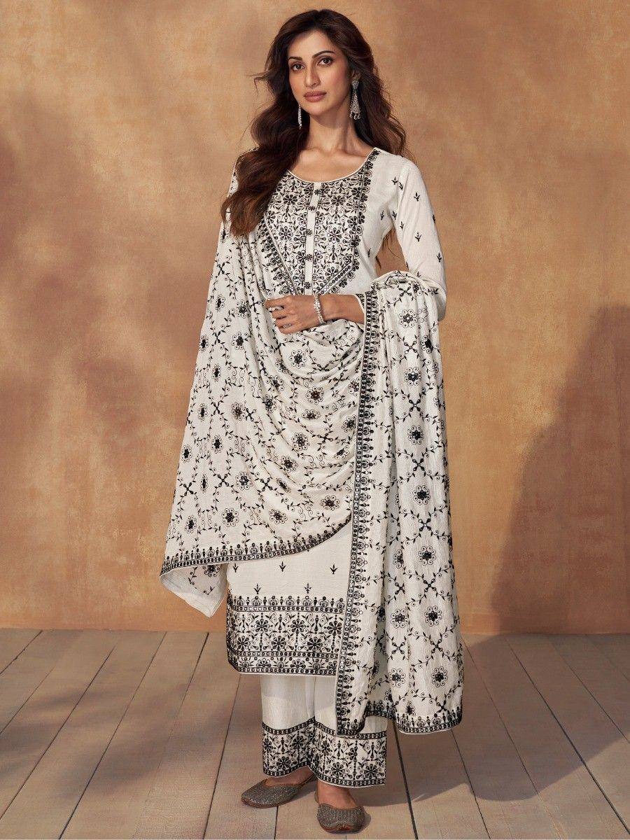 White and black embroidered salwar kameez with floral print, perfect for ethnic occasions