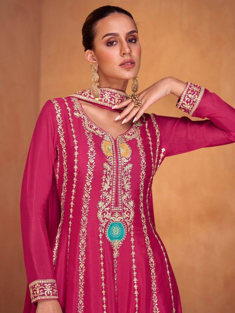 Pink embroidered ethnic kurti with gold detailing and turquoise accent, paired with matching dupatta