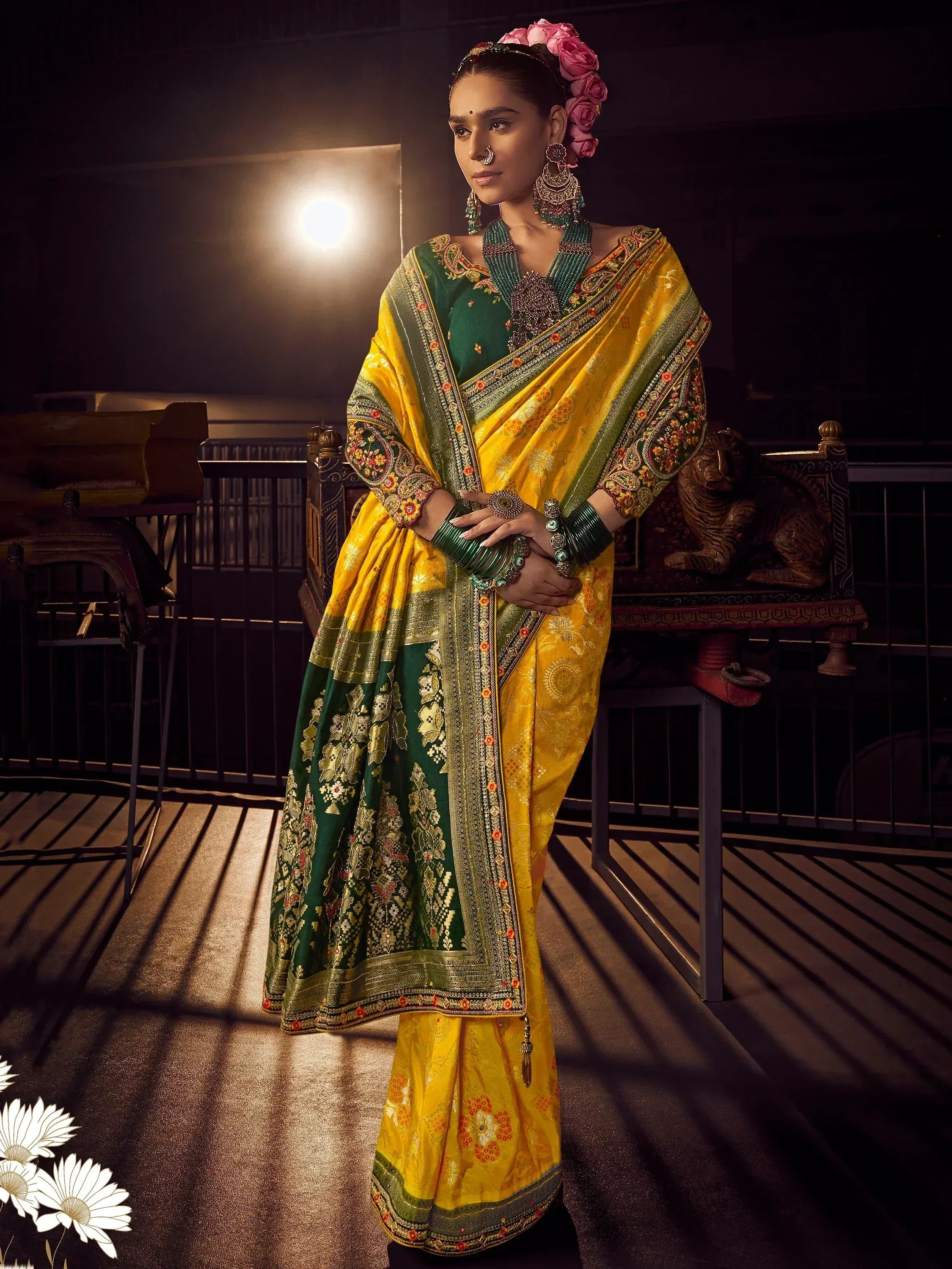 Elegant green and yellow designer saree with intricate embroidery and traditional jewelry for Indian ethnic wear