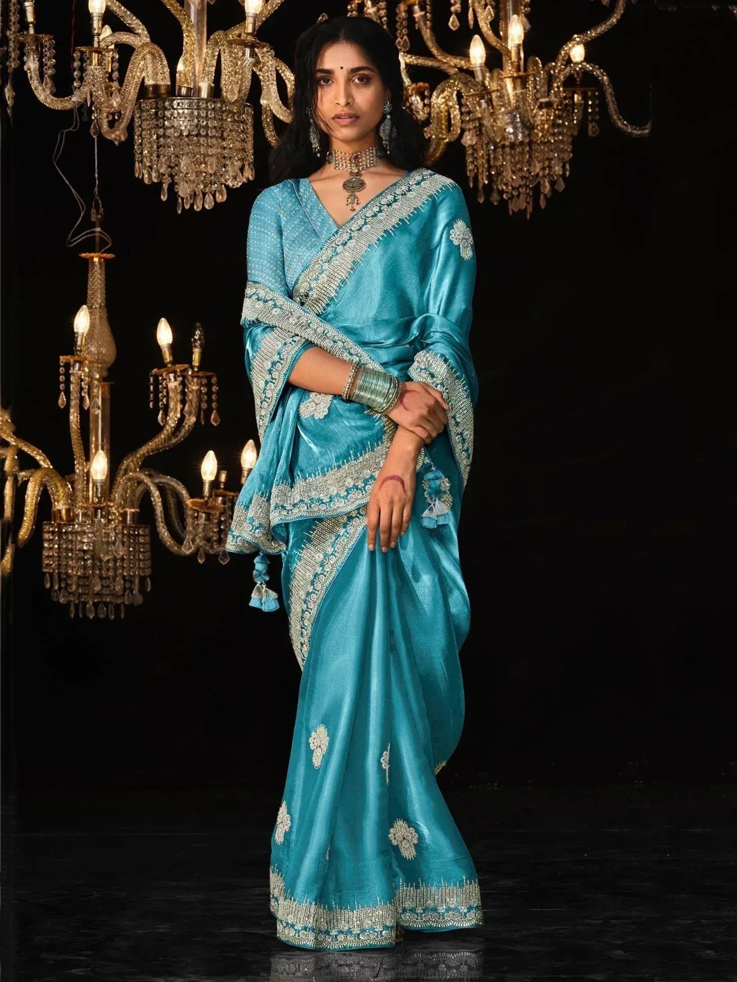 Turquoise designer saree with silver embroidery, perfect for Indian ethnic wear occasions