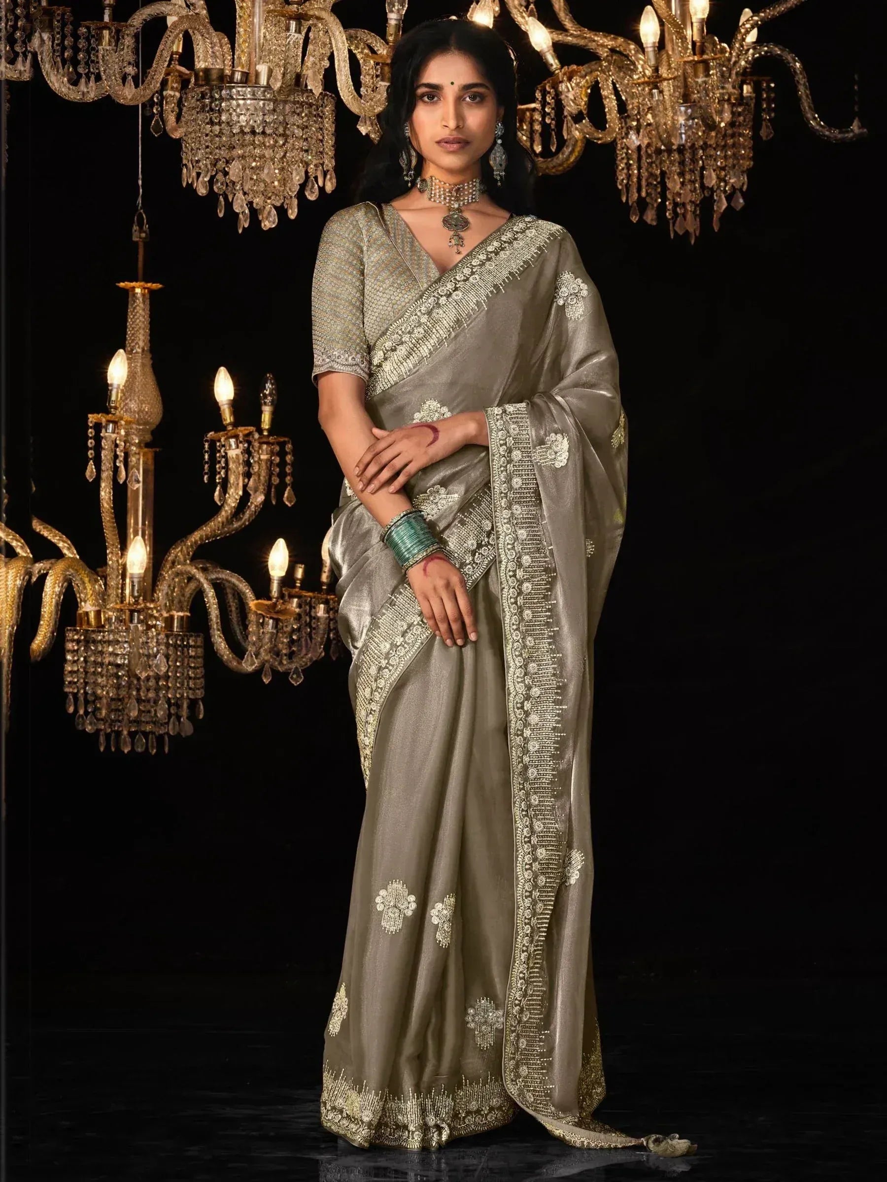 Elegant olive green saree with gold embroidery, perfect for Indian ethnic wear occasions