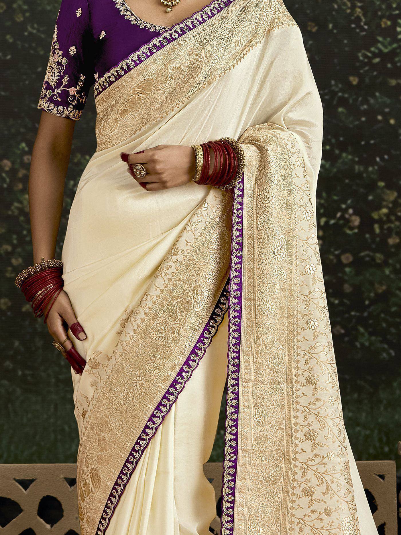 Cream saree with gold embroidery and purple blouse, ethnic Indian wear