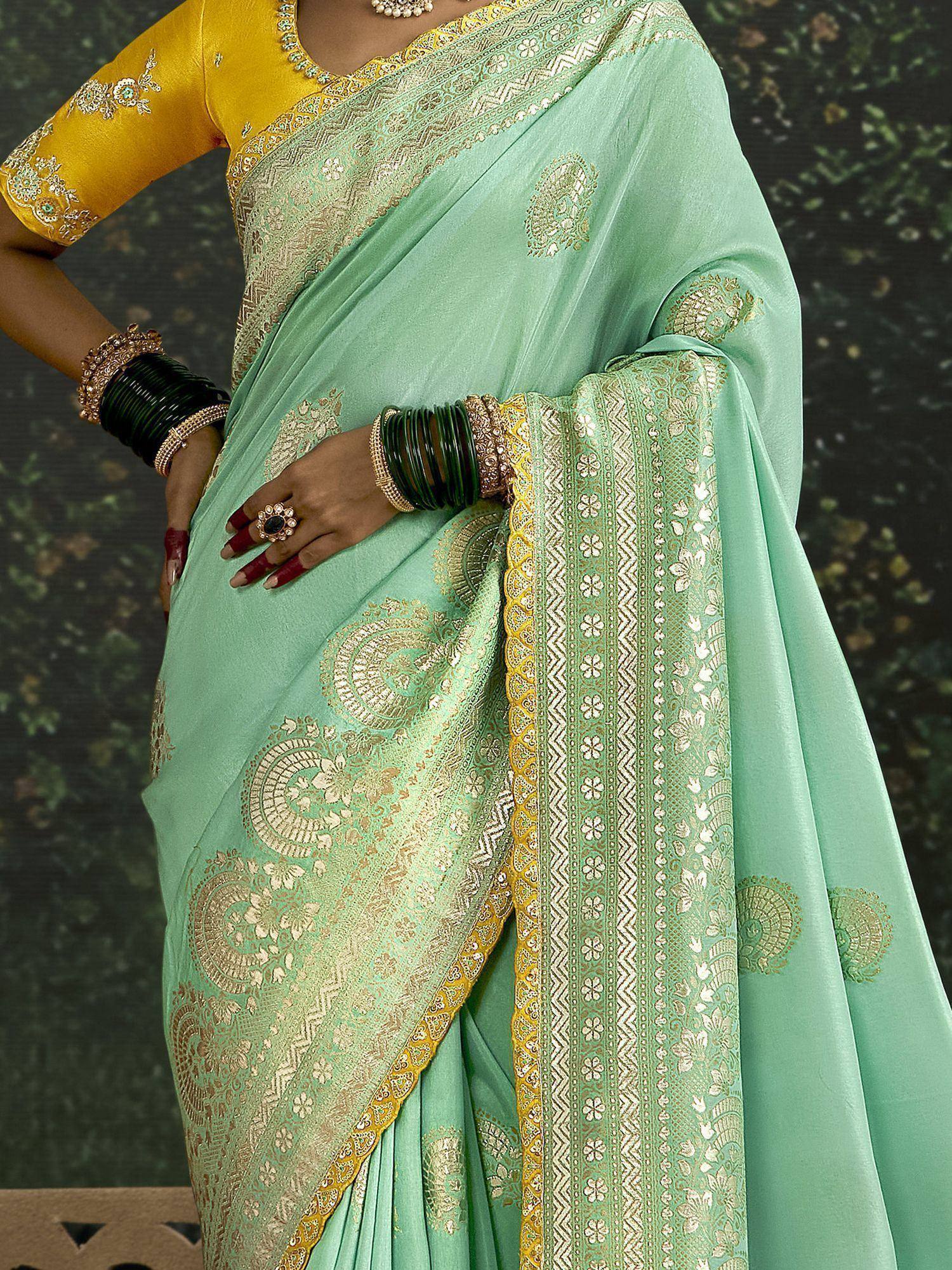 Mint green saree with gold embroidery and yellow blouse, ethnic Indian wear