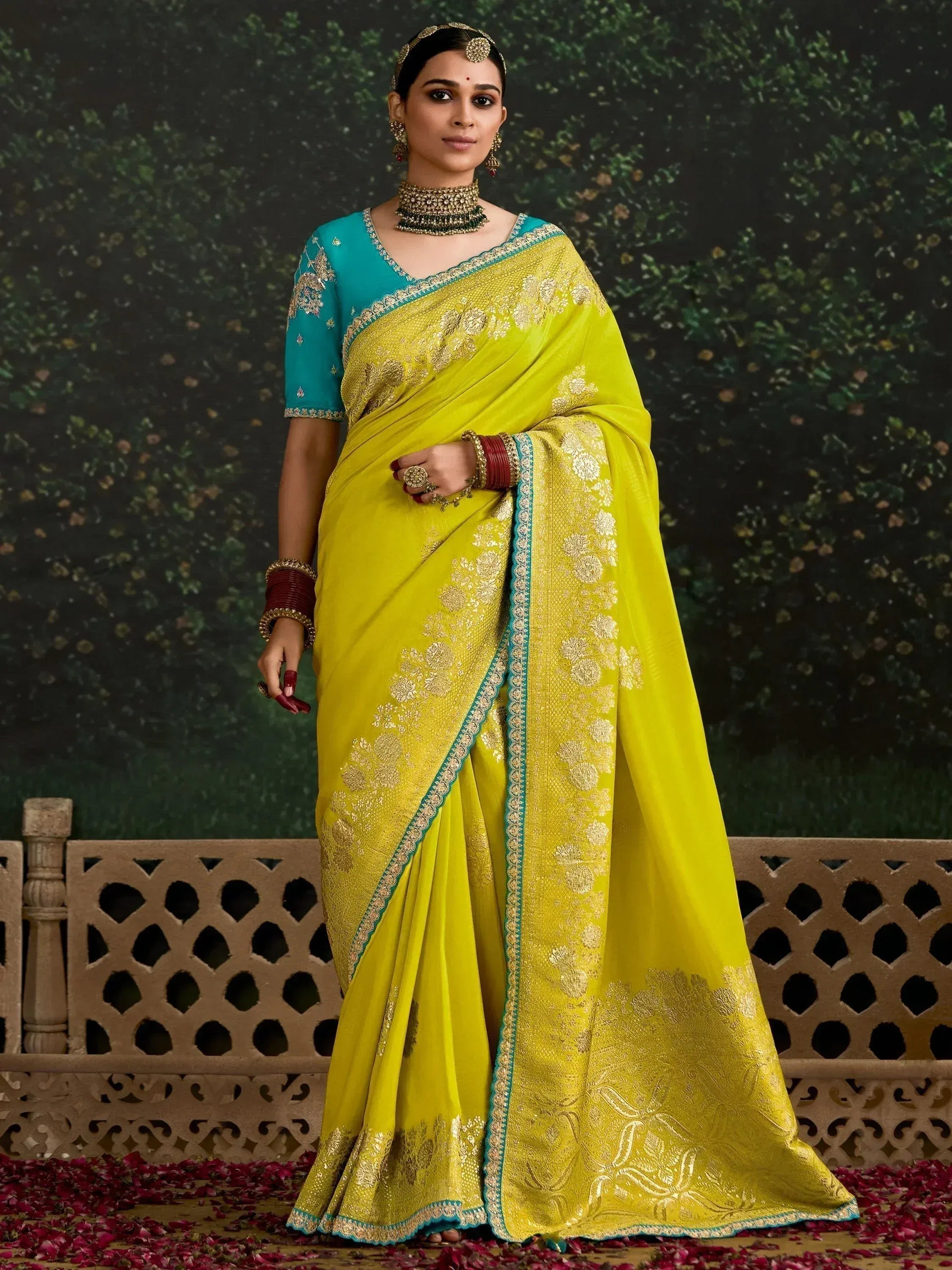 Yellow and teal designer saree with gold embroidery, perfect for Indian ethnic occasions