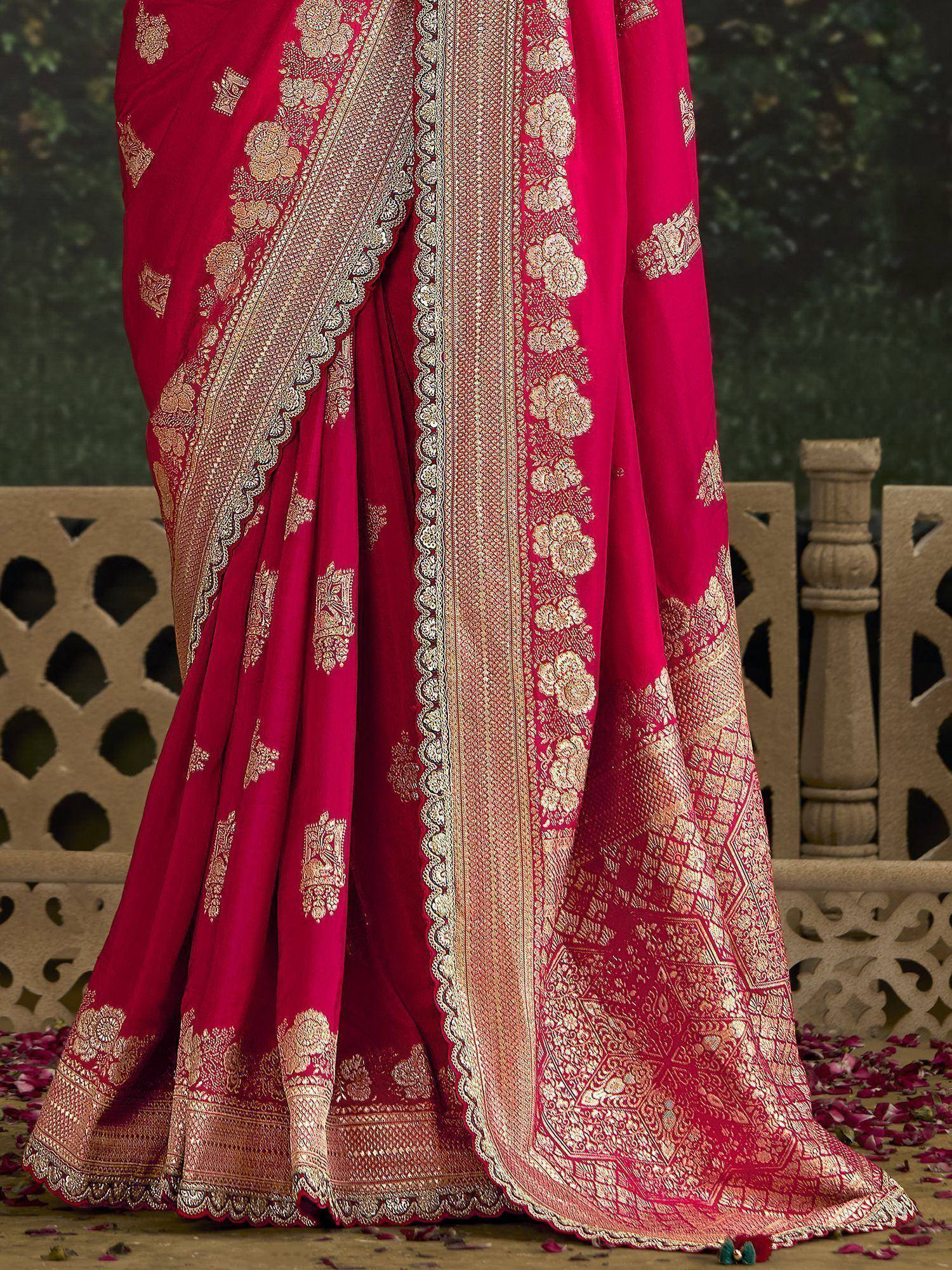 Rich red designer saree with gold floral embroidery and intricate border, perfect for ethnic occasions