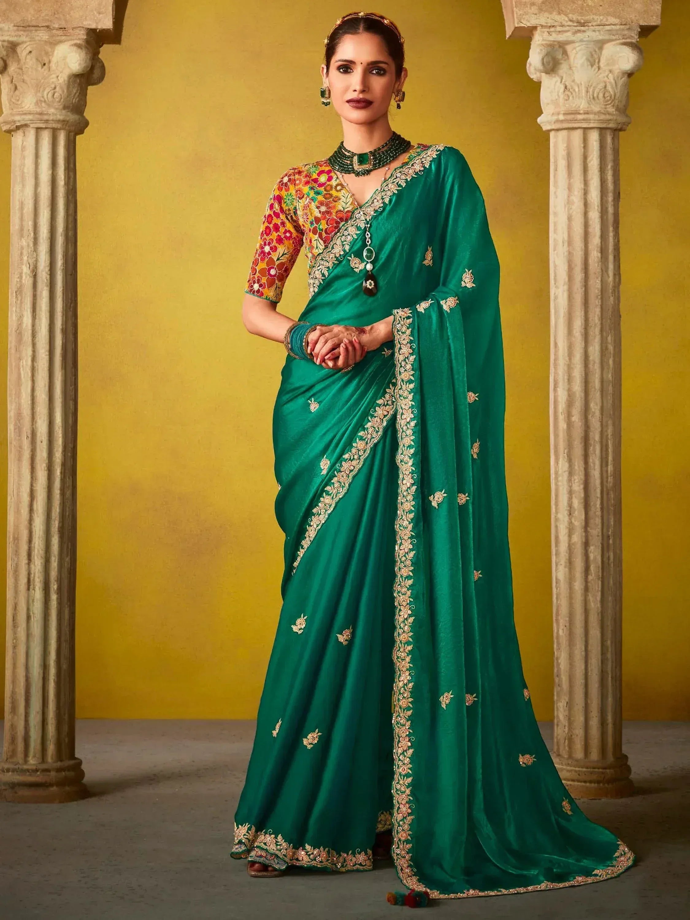 Emerald green designer saree with floral blouse, gold embroidery, perfect for Indian ethnic wear occasions