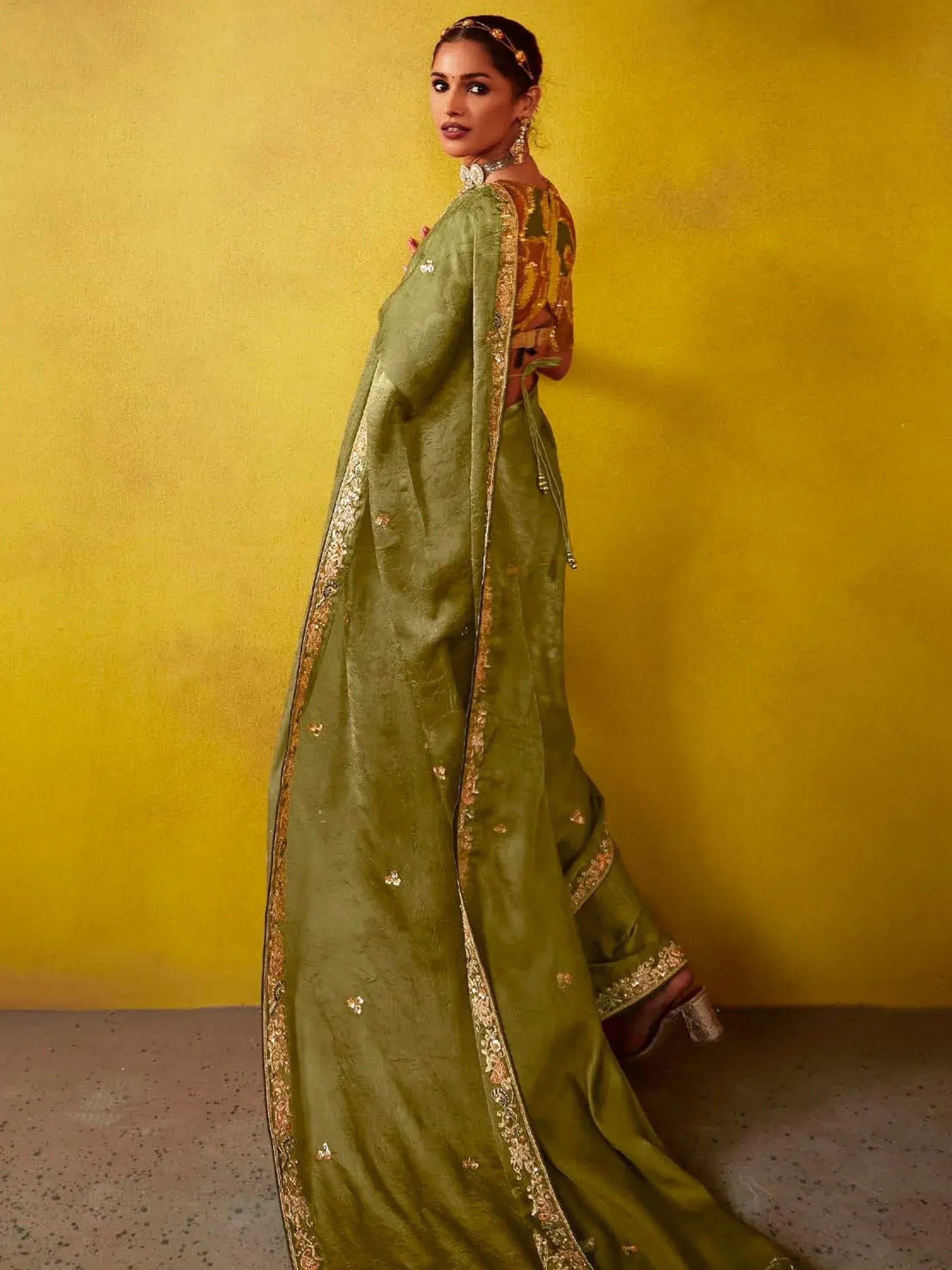Olive green designer lehenga choli with gold embroidery, perfect for Indian ethnic wear occasions