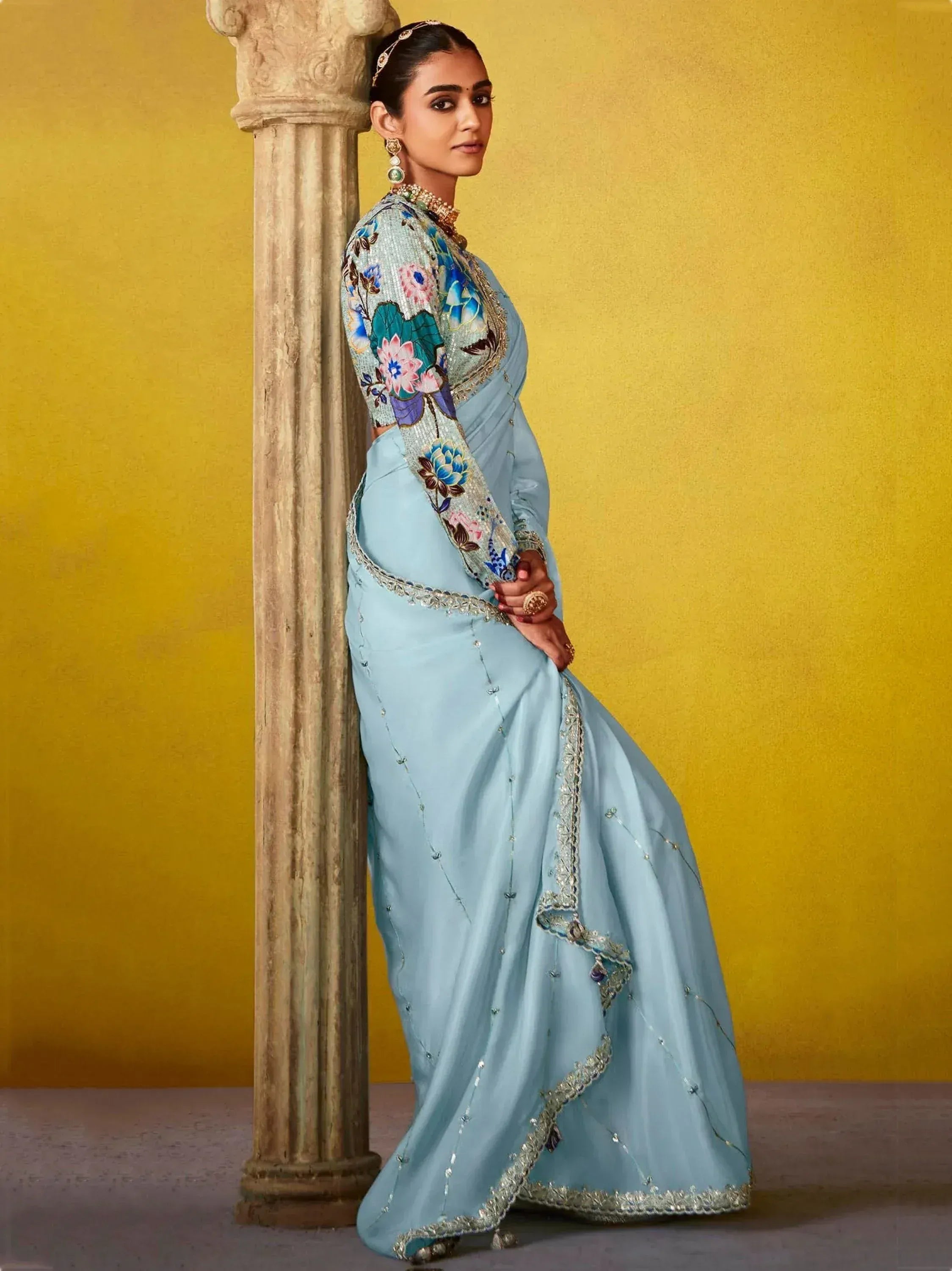 Light blue designer saree with floral embroidered blouse, perfect for Indian ethnic wear occasions