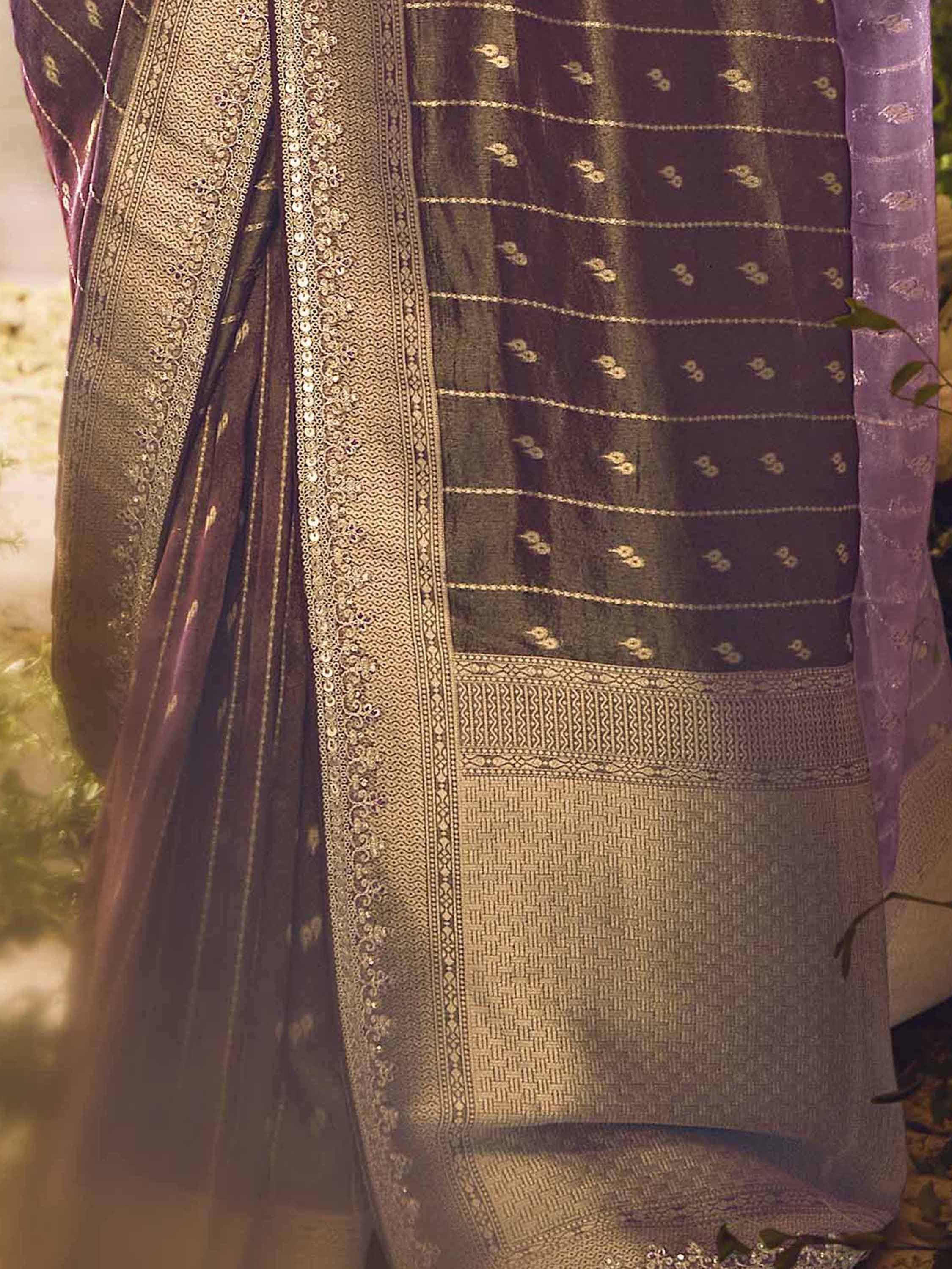 Elegant Indian ethnic saree with gold embroidery and sequin border, perfect for festive occasions.