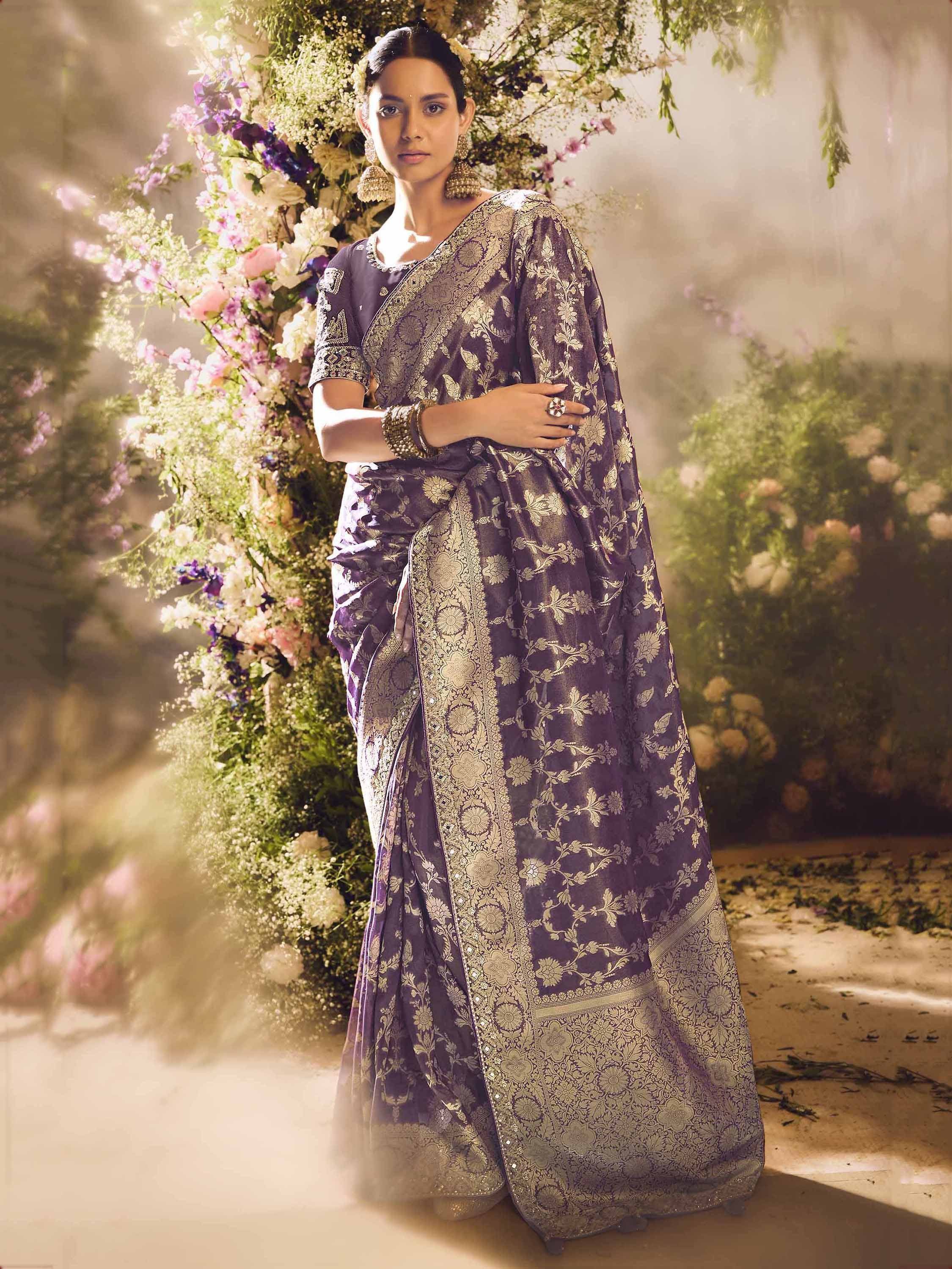 Purple and gold embroidered saree with floral backdrop, Indian ethnic wear