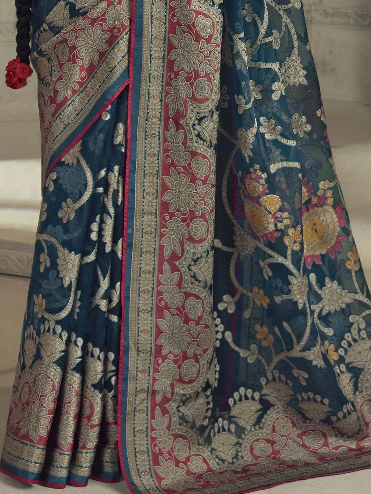 Blue and red floral embroidered saree with intricate gold detailing, perfect for Indian ethnic wear occasions.