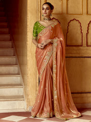 Wonderful Peach Organza Festival Wear Saree With Green Blouse