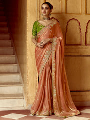 Wonderful Peach Organza Festival Wear Saree With Green Blouse