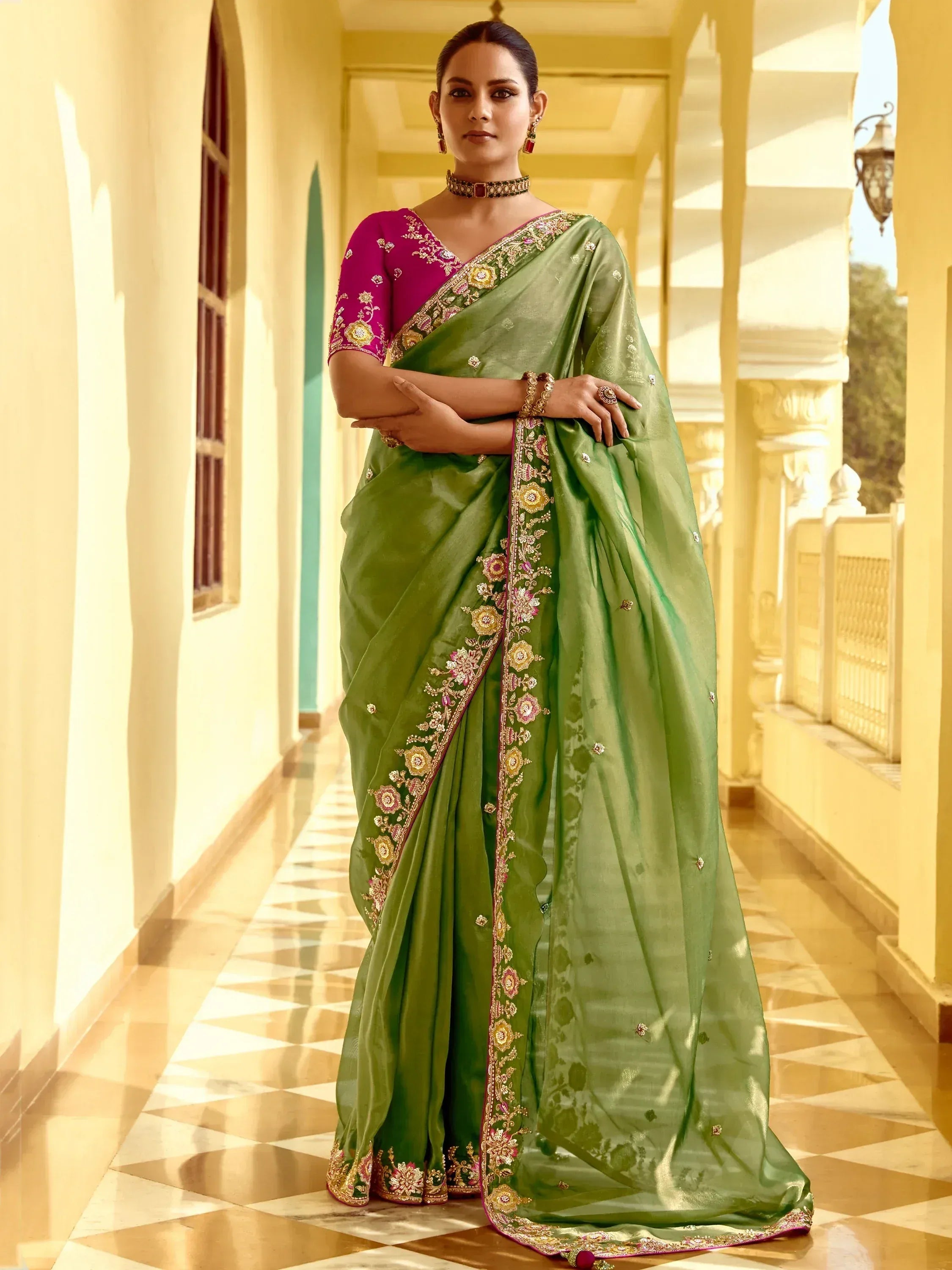 Green embroidered saree with pink blouse, perfect for Indian ethnic wear occasions