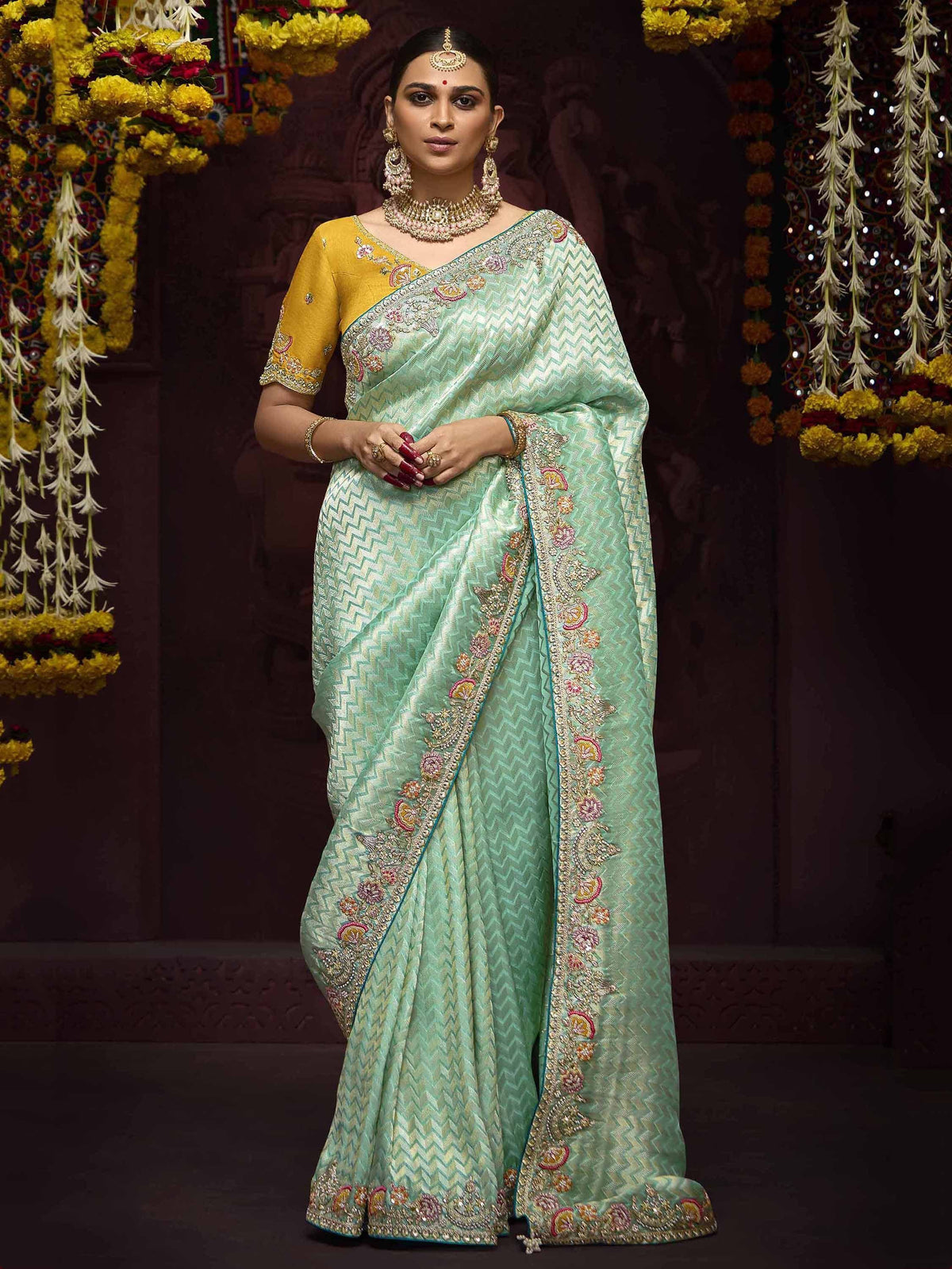Mint green embroidered saree with yellow blouse, perfect for Indian ethnic wear occasions
