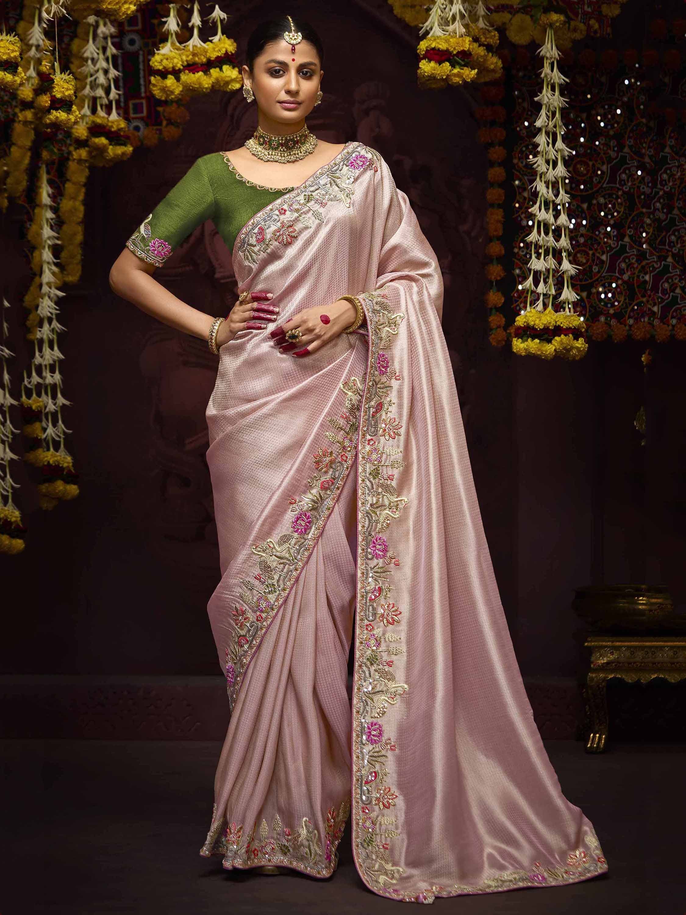 Elegant pink embroidered saree with green blouse, perfect for Indian ethnic occasions and festive events.