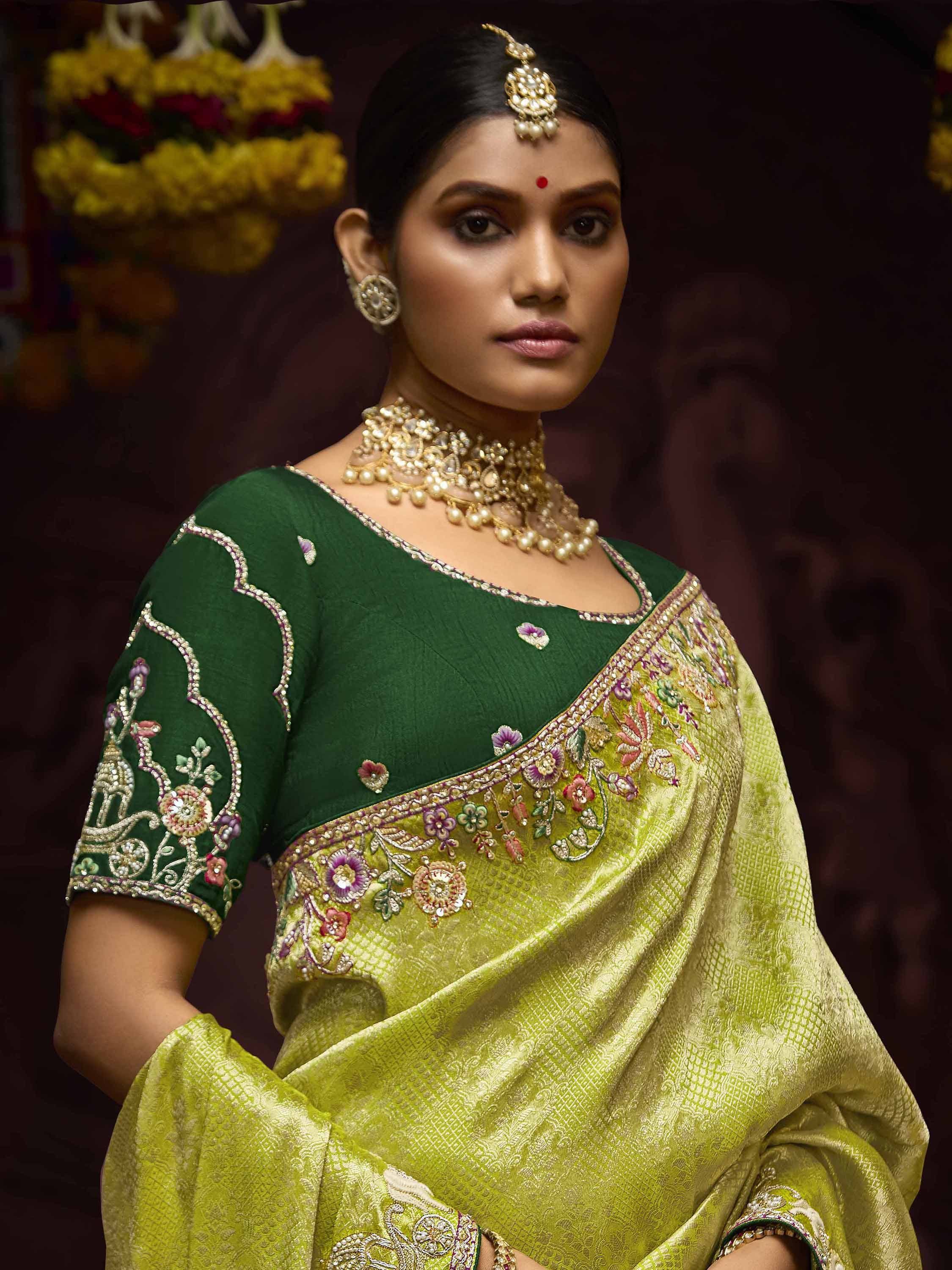 Green and yellow embroidered saree with floral design, traditional Indian ethnic wear for women