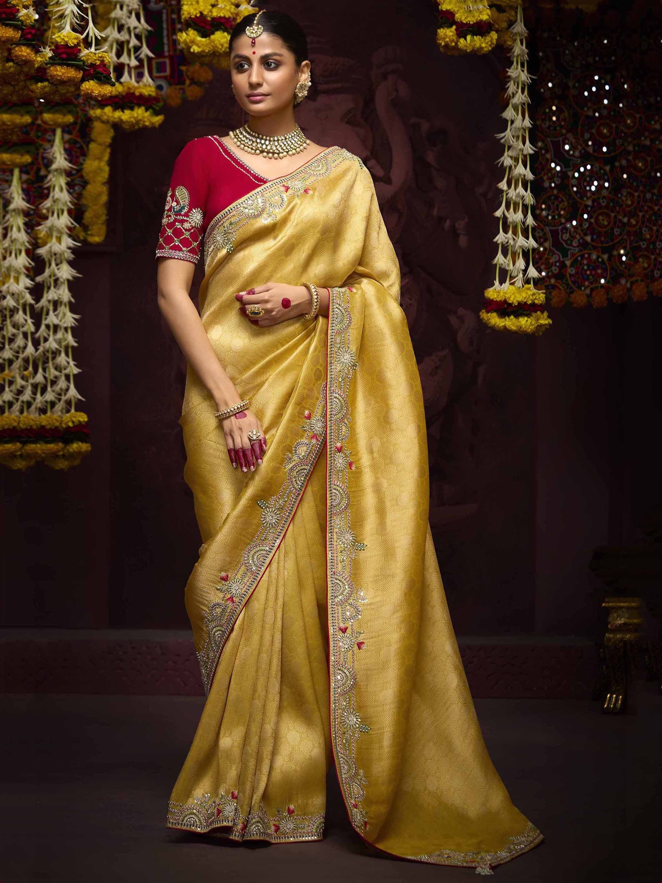Golden embroidered saree with red blouse, perfect for Indian ethnic wear and festive occasions