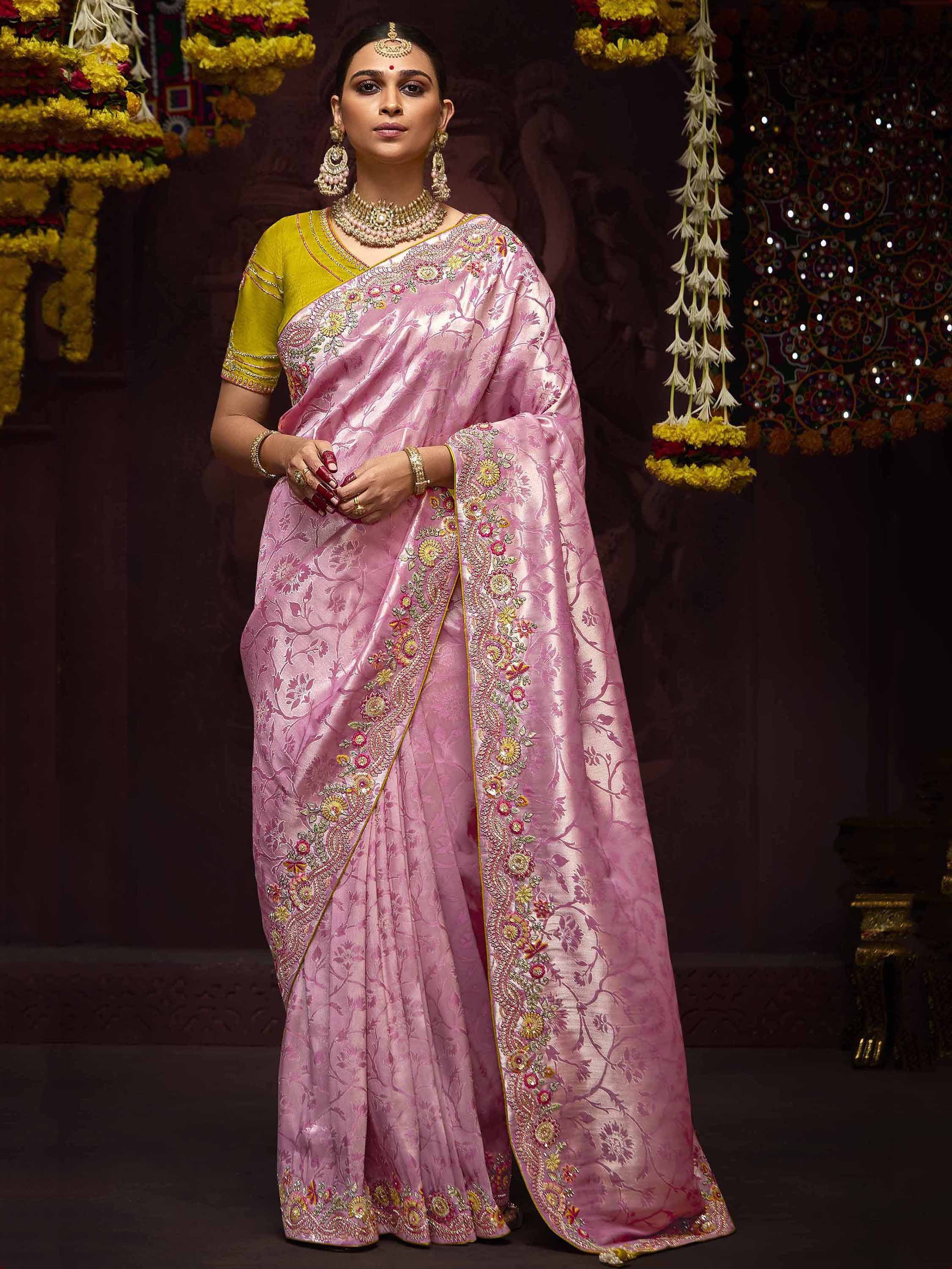 Pink floral embroidered saree with yellow blouse, traditional Indian ethnic wear for weddings and festivals