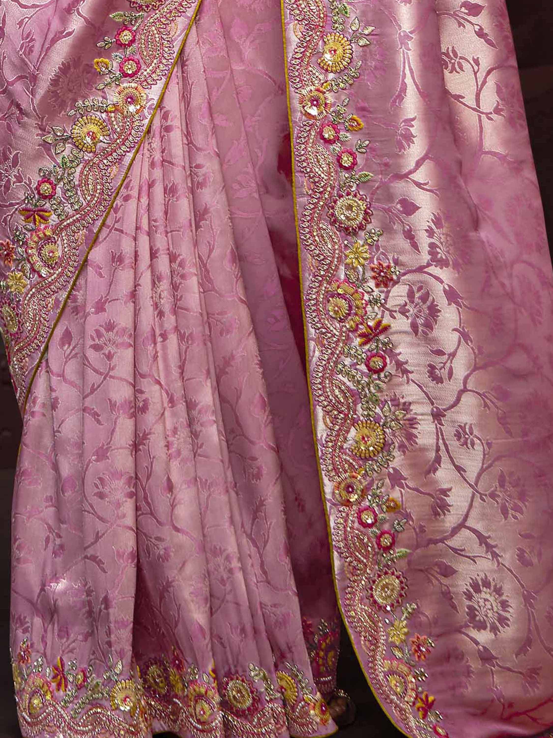 Pink embroidered lehenga choli with floral zari work and golden border, Indian ethnic wear