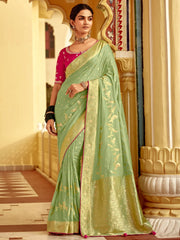 Bewitching Sea Green Zari Weaving Dola Silk Saree With Blouse