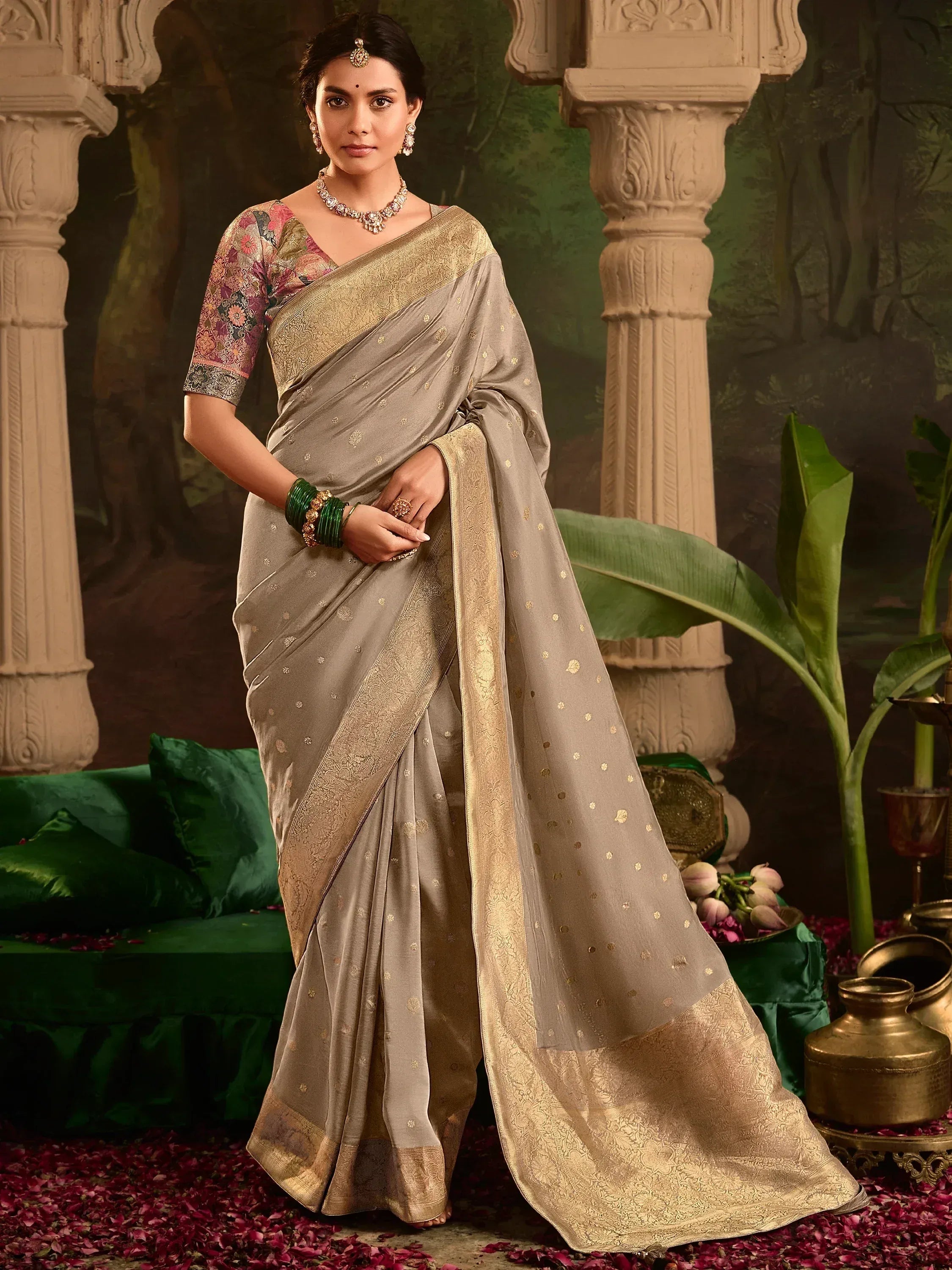 Elegant grey saree with gold zari work and floral blouse, perfect for Indian ethnic occasions