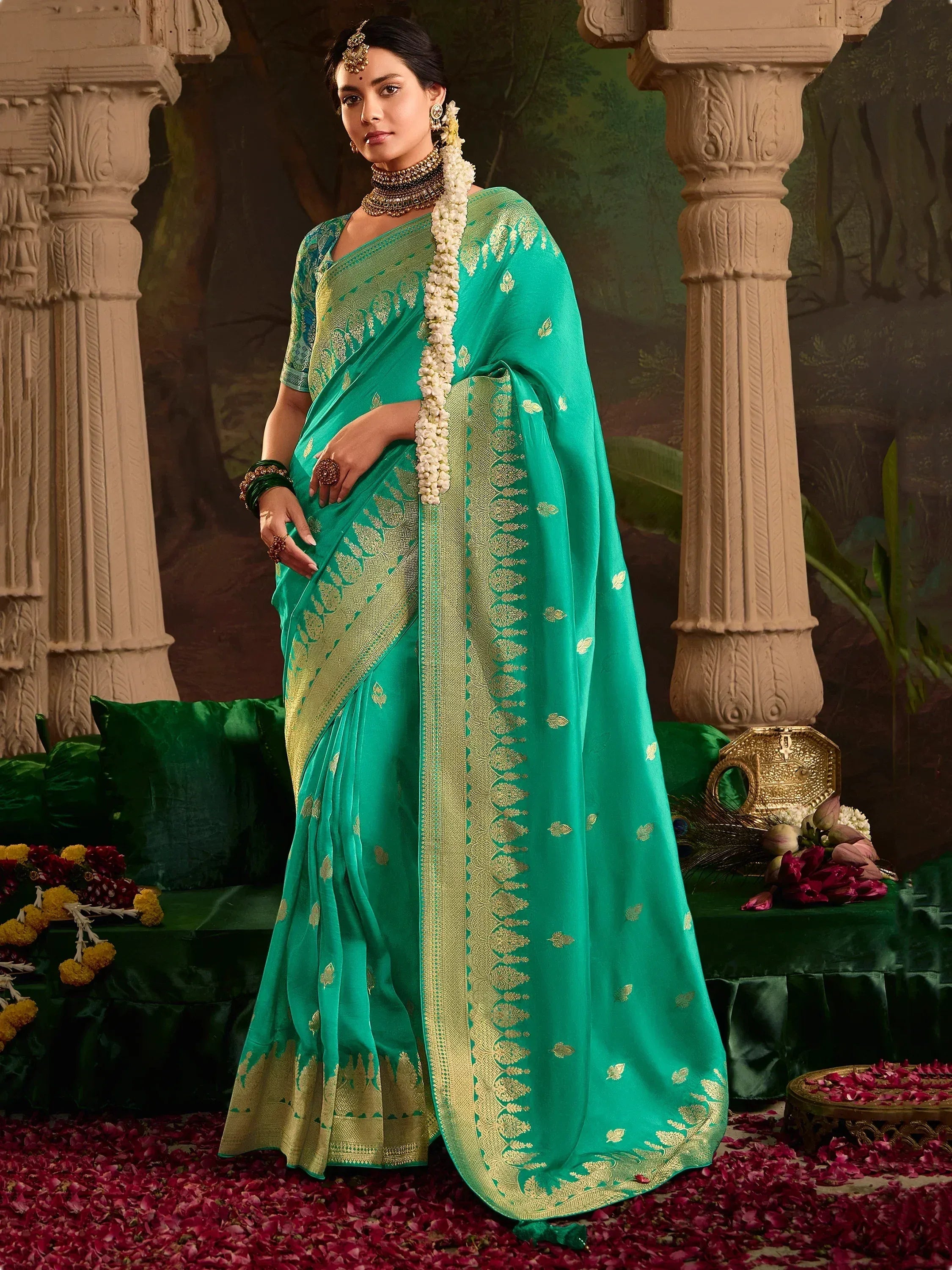 Elegant green saree with gold embroidery, perfect for Indian ethnic wear and festive occasions.