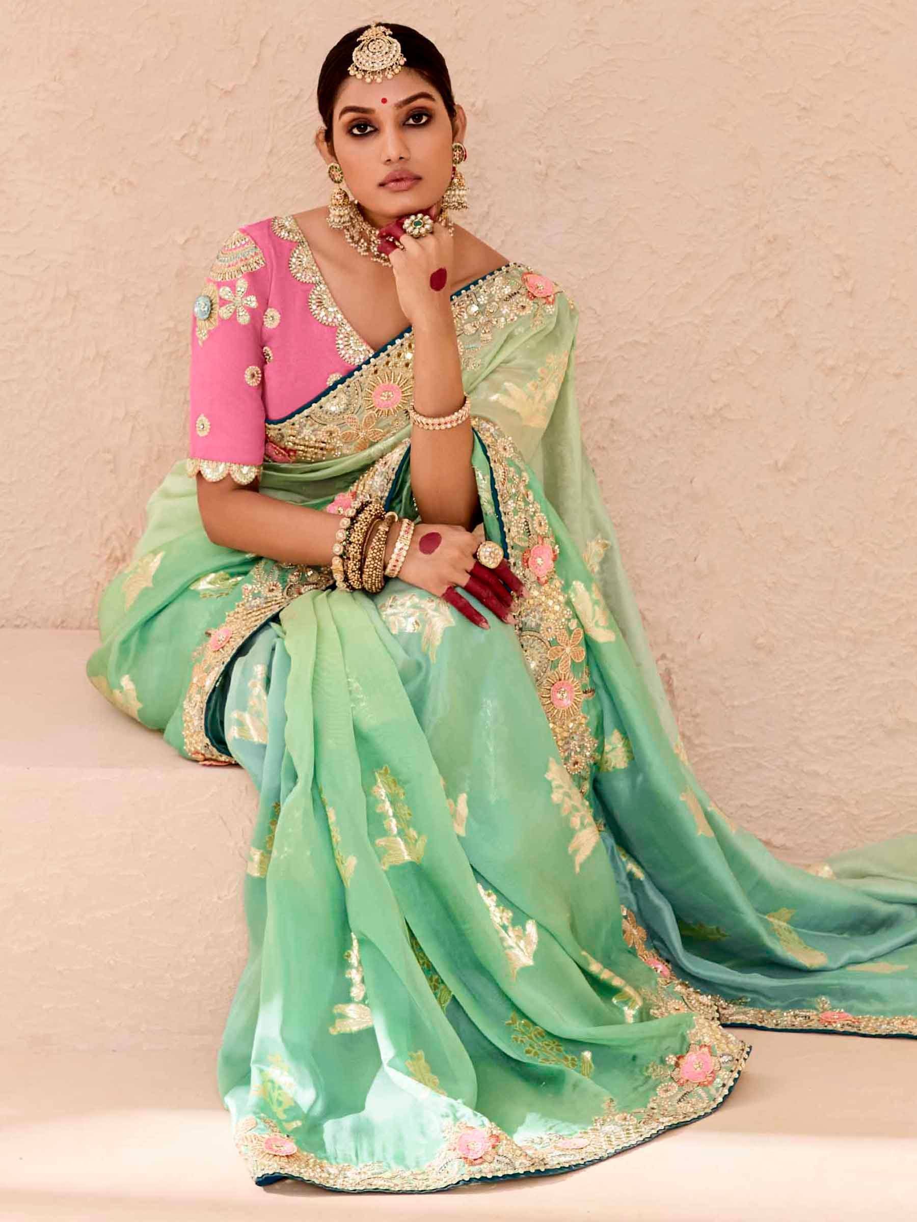 Mint green embroidered saree with pink blouse, perfect for Indian ethnic wear and festive occasions
