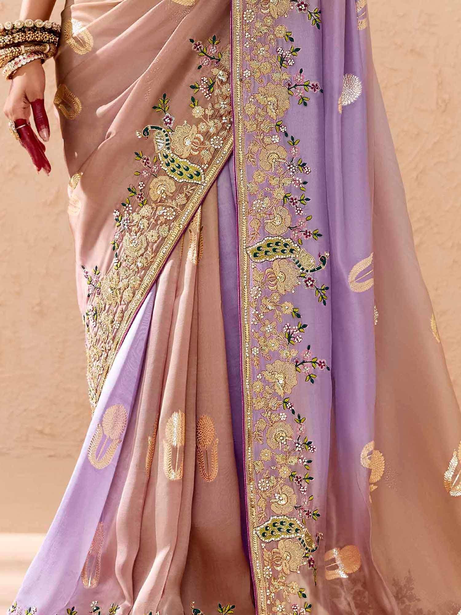 Elegant Indian saree with peacock and floral embroidery, perfect for weddings and festivals
