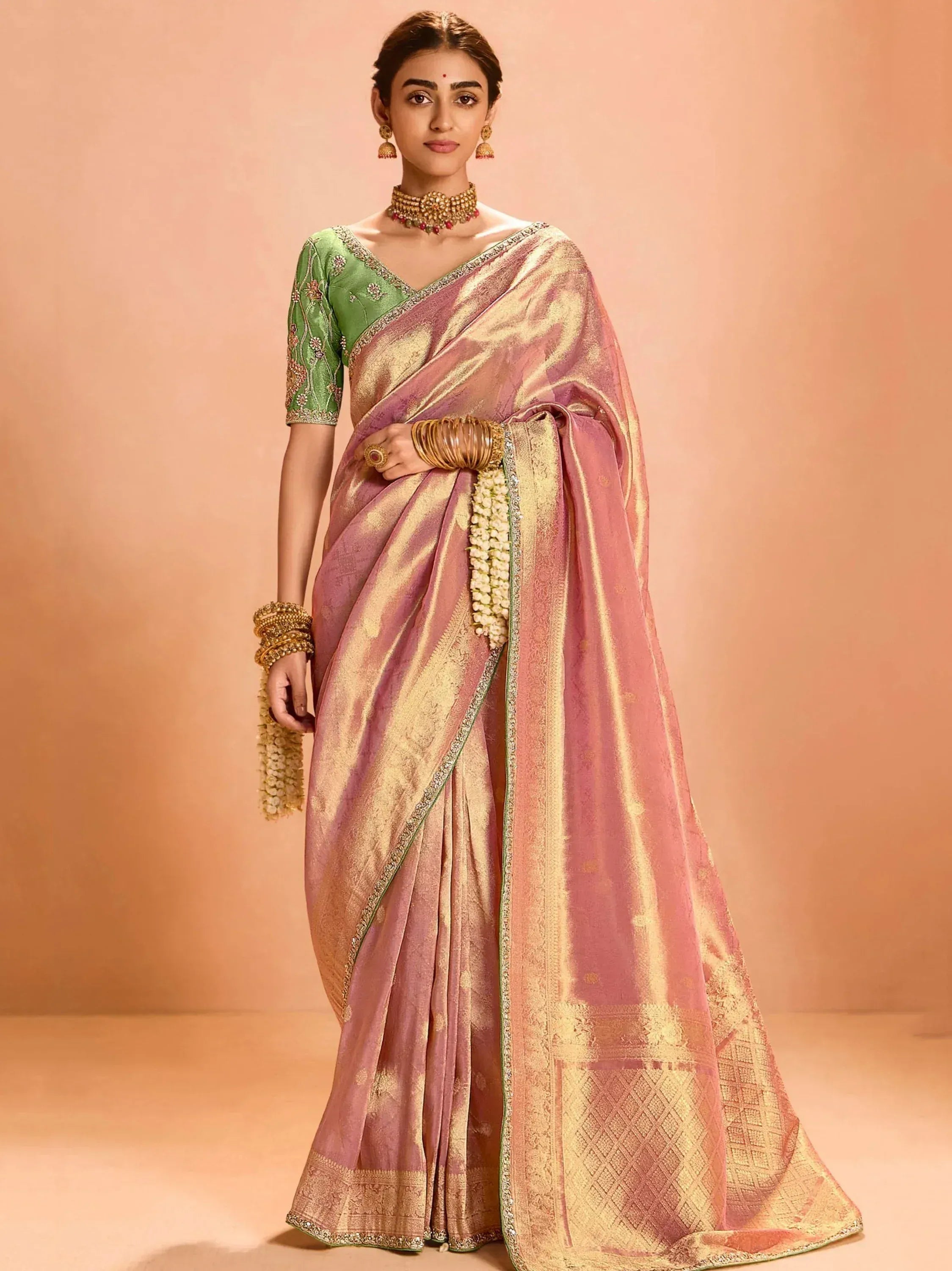 Pink and gold silk saree with green embroidered blouse, traditional Indian ethnic wear for women