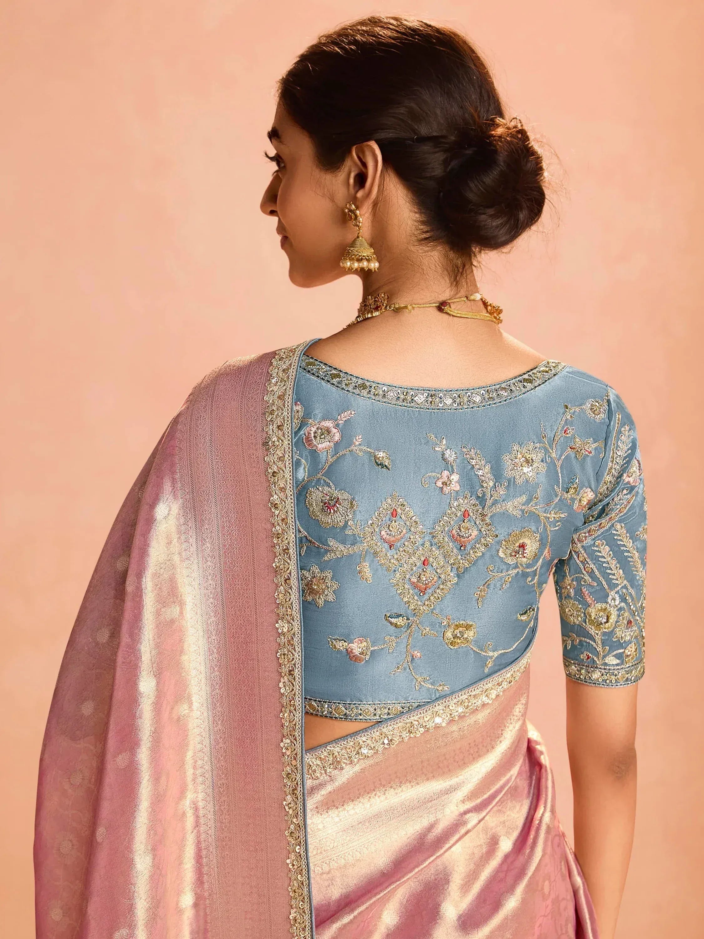 Blue embroidered blouse with pink saree, floral zari work, ethnic Indian wear