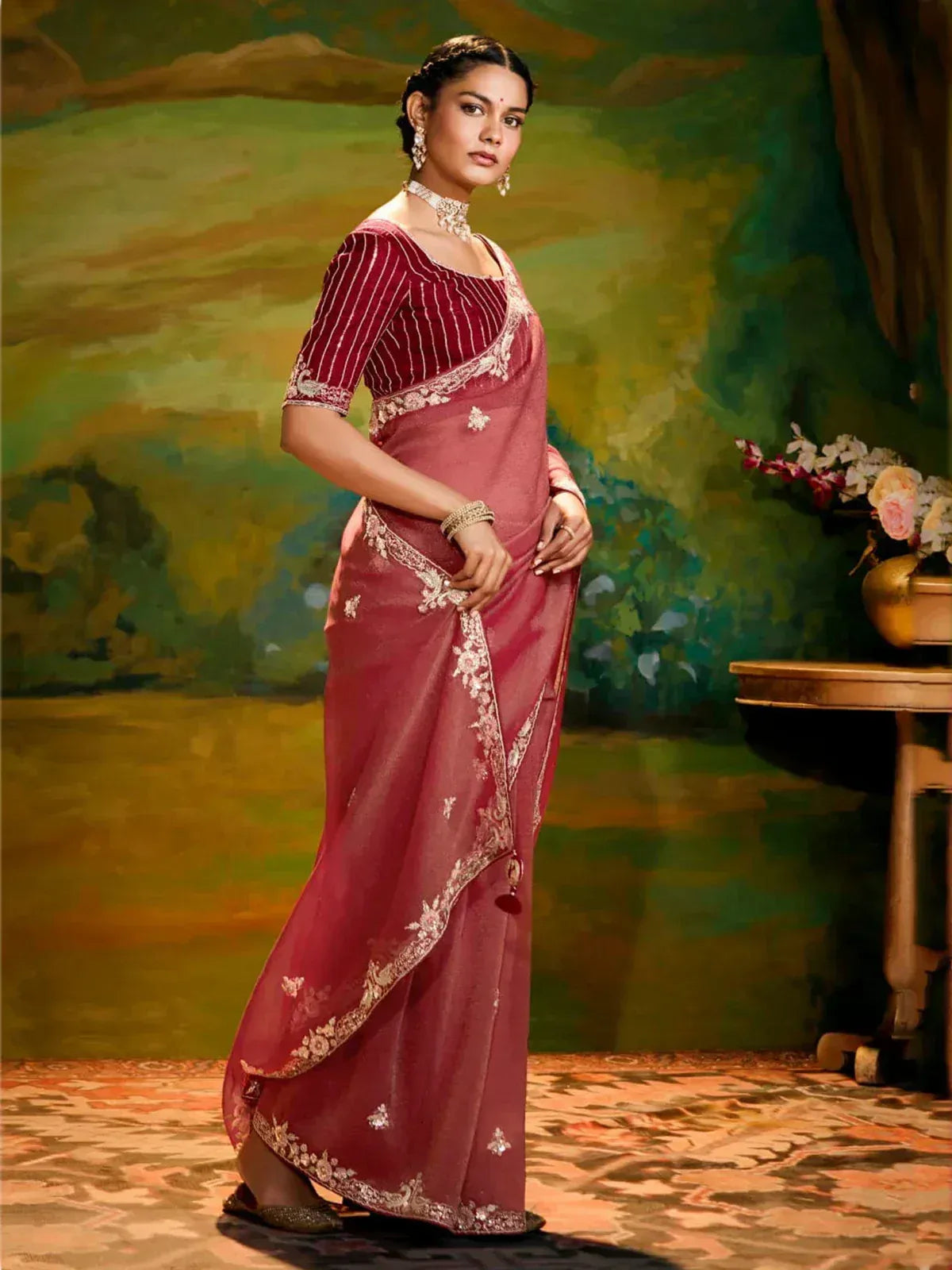 Elegant maroon saree with gold embroidery and matching blouse, styled for Indian ethnic occasions
