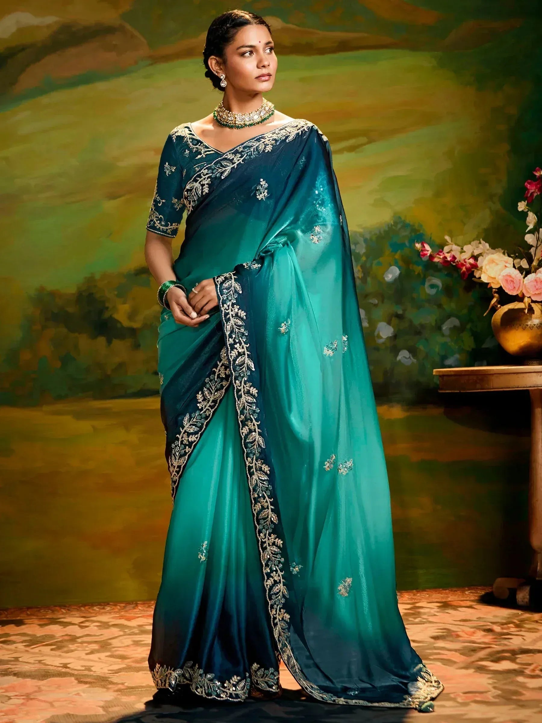 Teal designer saree with gold embroidery, perfect for Indian ethnic wear occasions