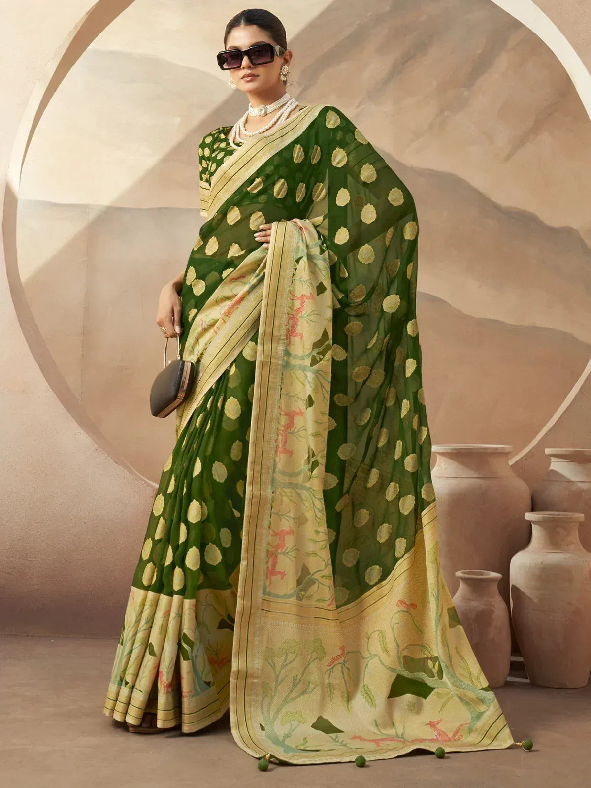 Green and gold printed saree with floral motifs, perfect for ethnic occasions and festive wear