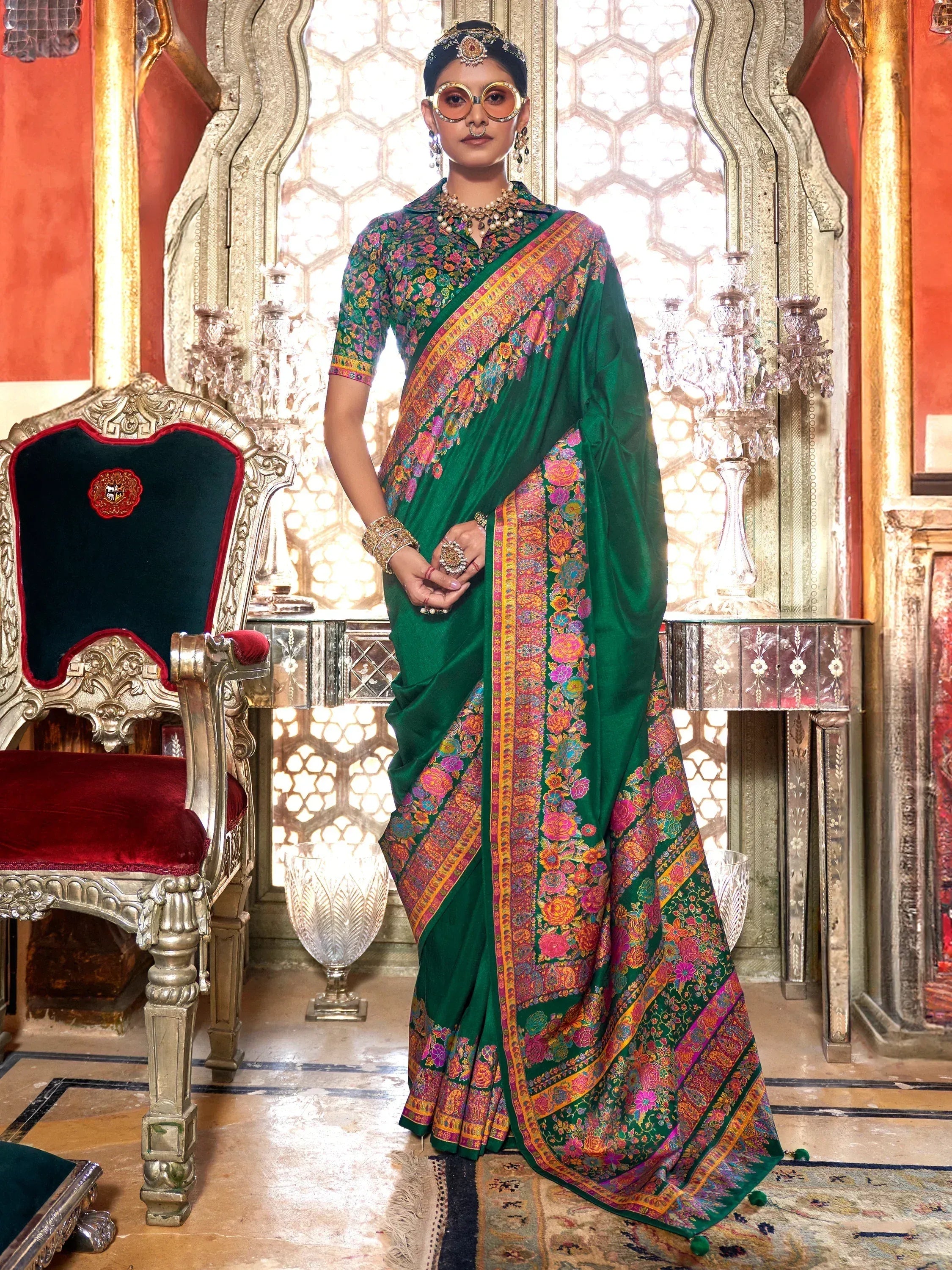 Elegant green floral saree with vibrant border, perfect for Indian ethnic occasions and festive wear.