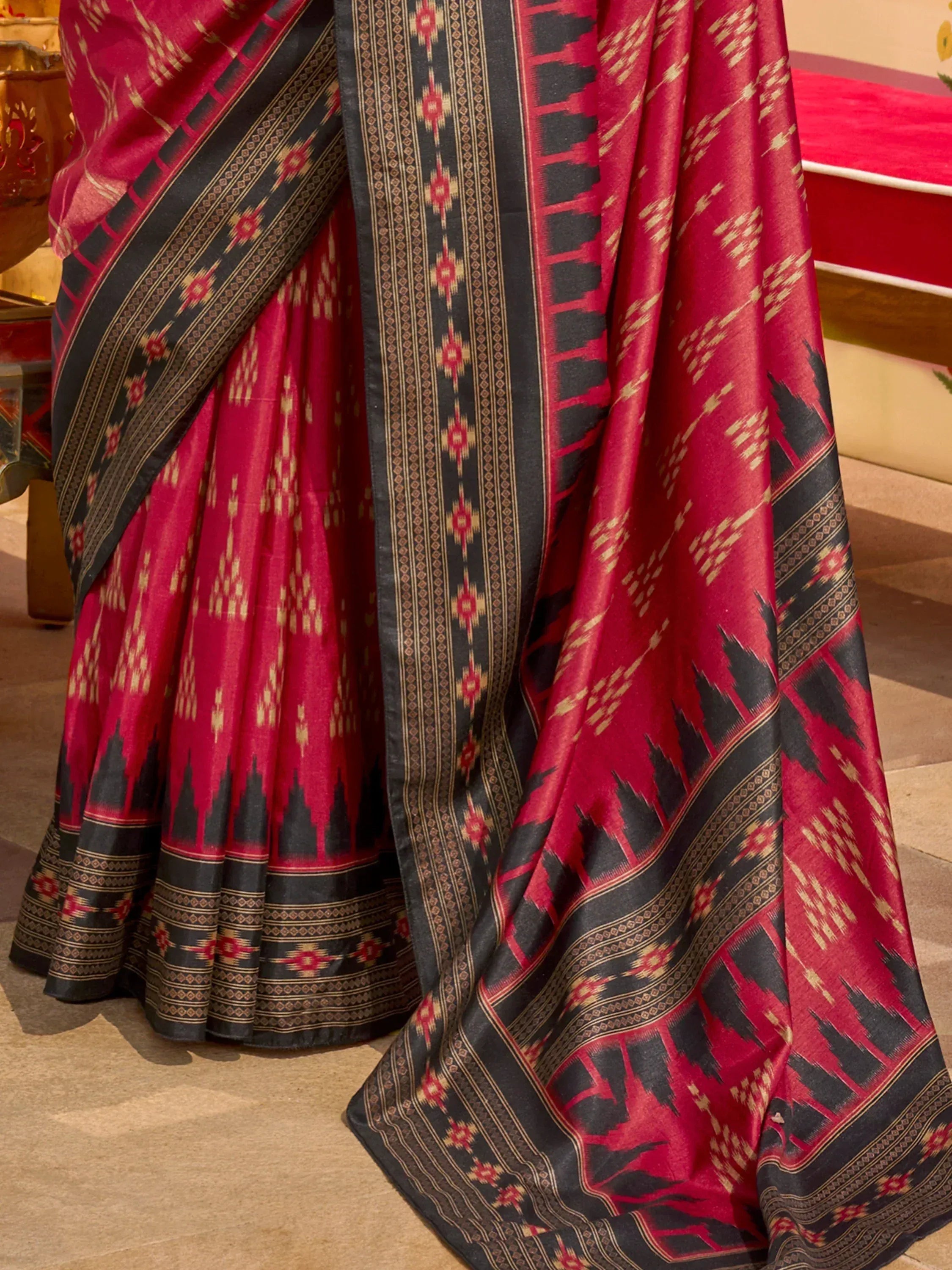 Red and black ikat saree with geometric patterns, ethnic Indian wear
