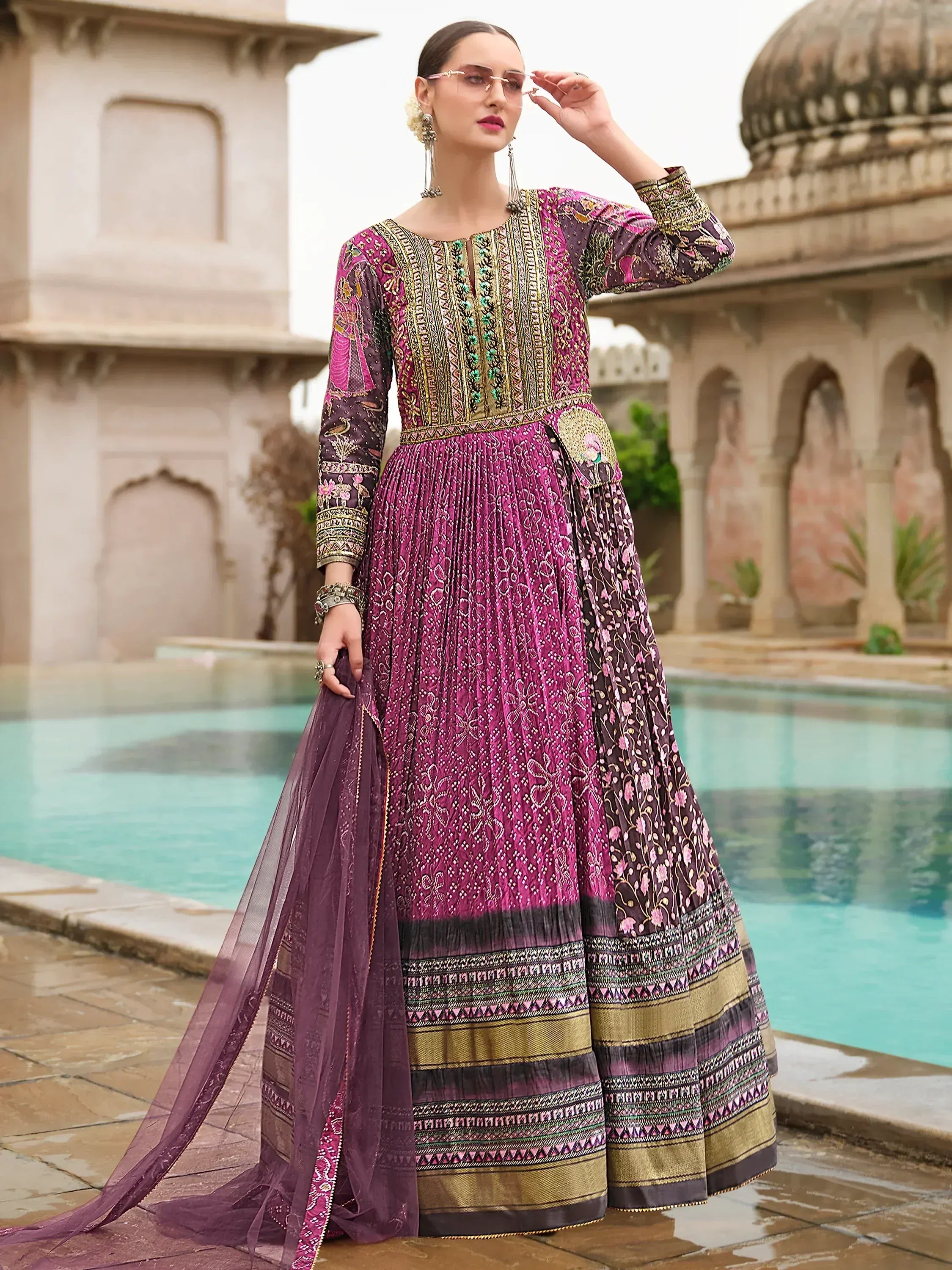 Elegant purple and gold embroidered anarkali suit with pleated skirt, perfect for Indian ethnic wear occasions
